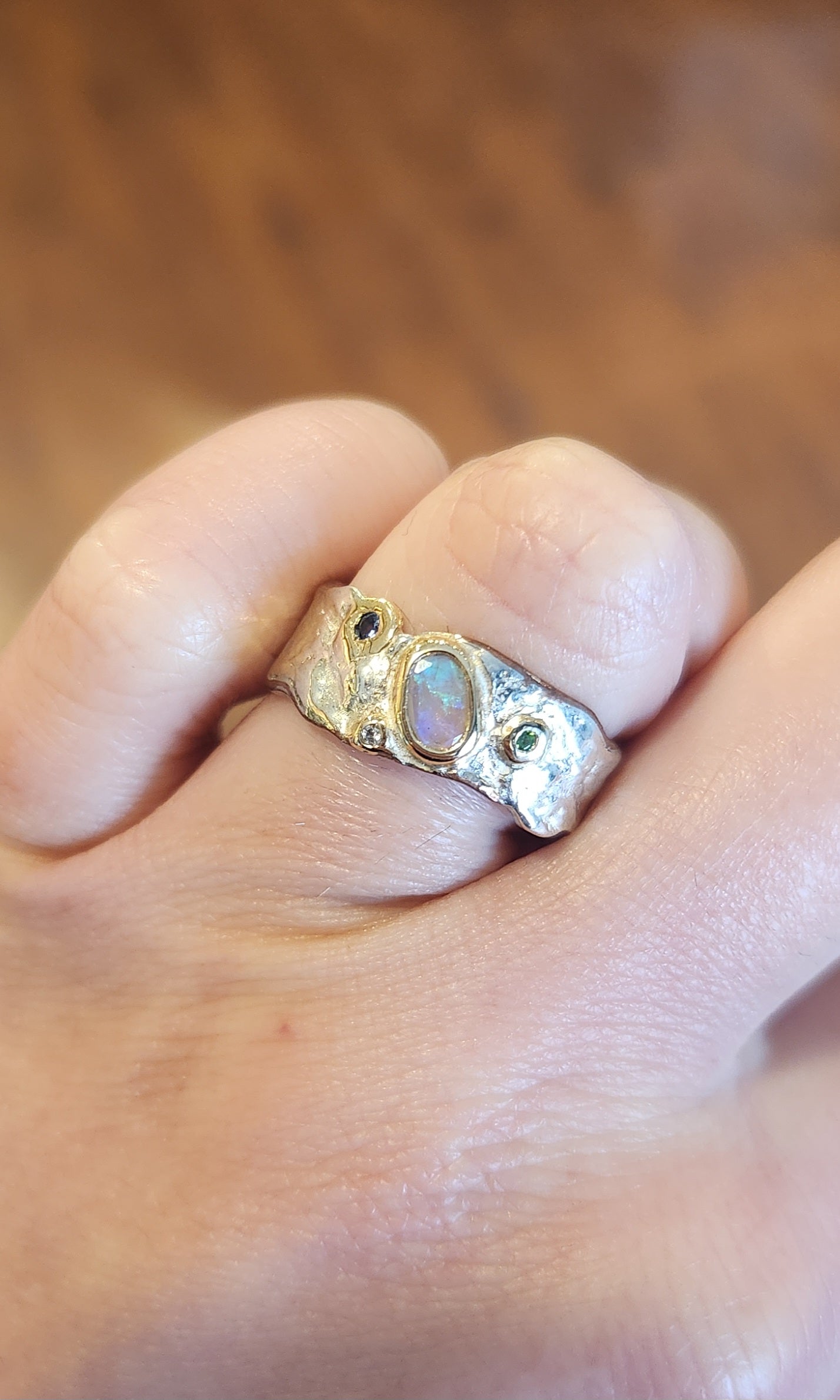 Sterling silver with 14k gold sapphire and diamond opal band