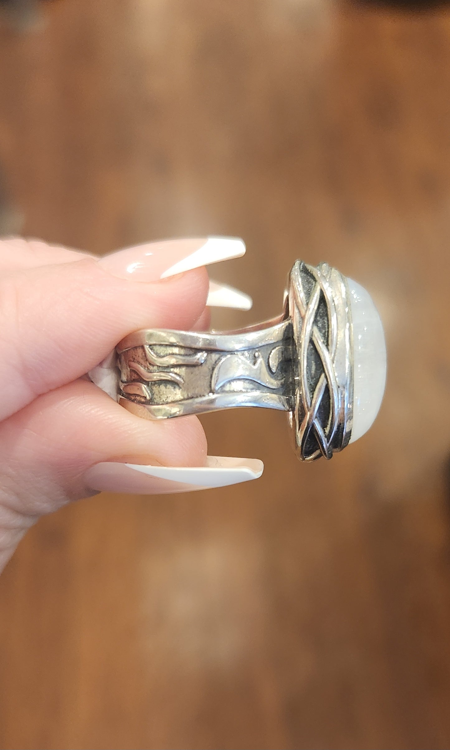 Sterling silver oval-shaped rainbow moonstone statement ring