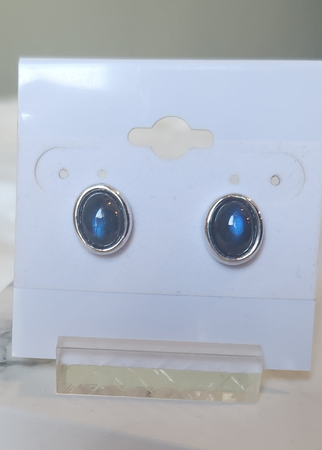 Sterling silver oval blue spectrolite studs