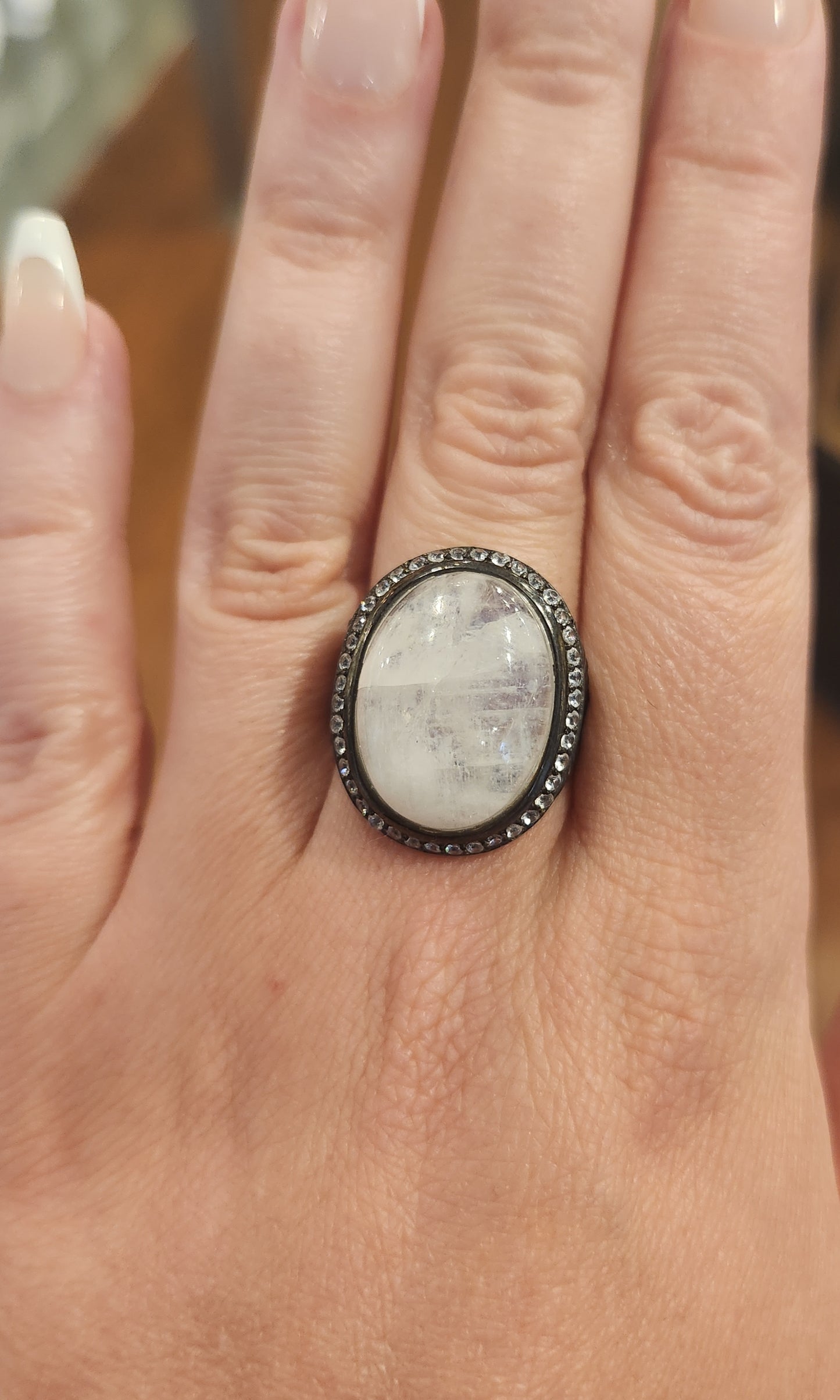 Sterling silver rainbow moonstone ring with white topaz