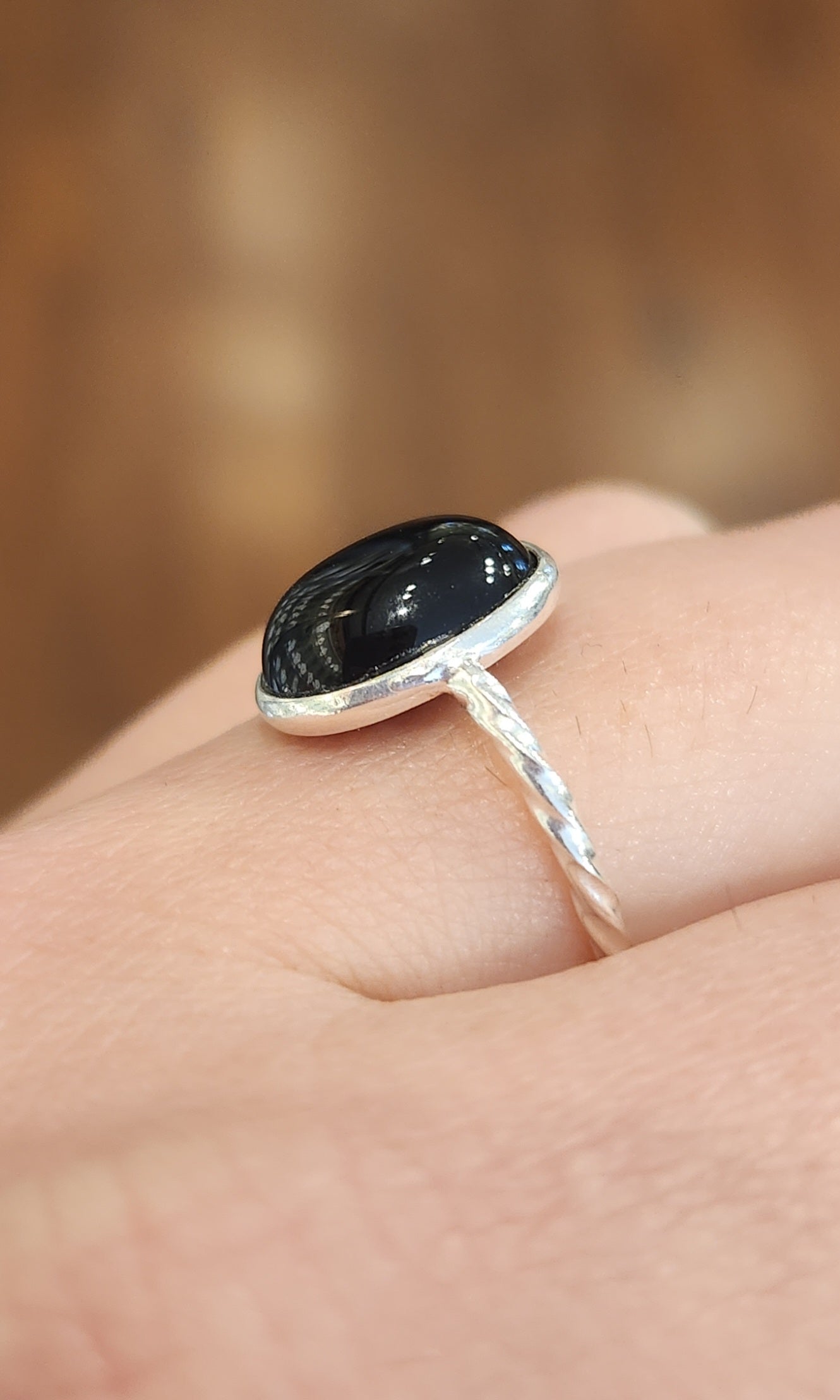 Sterling silver black onyx twisted band ring