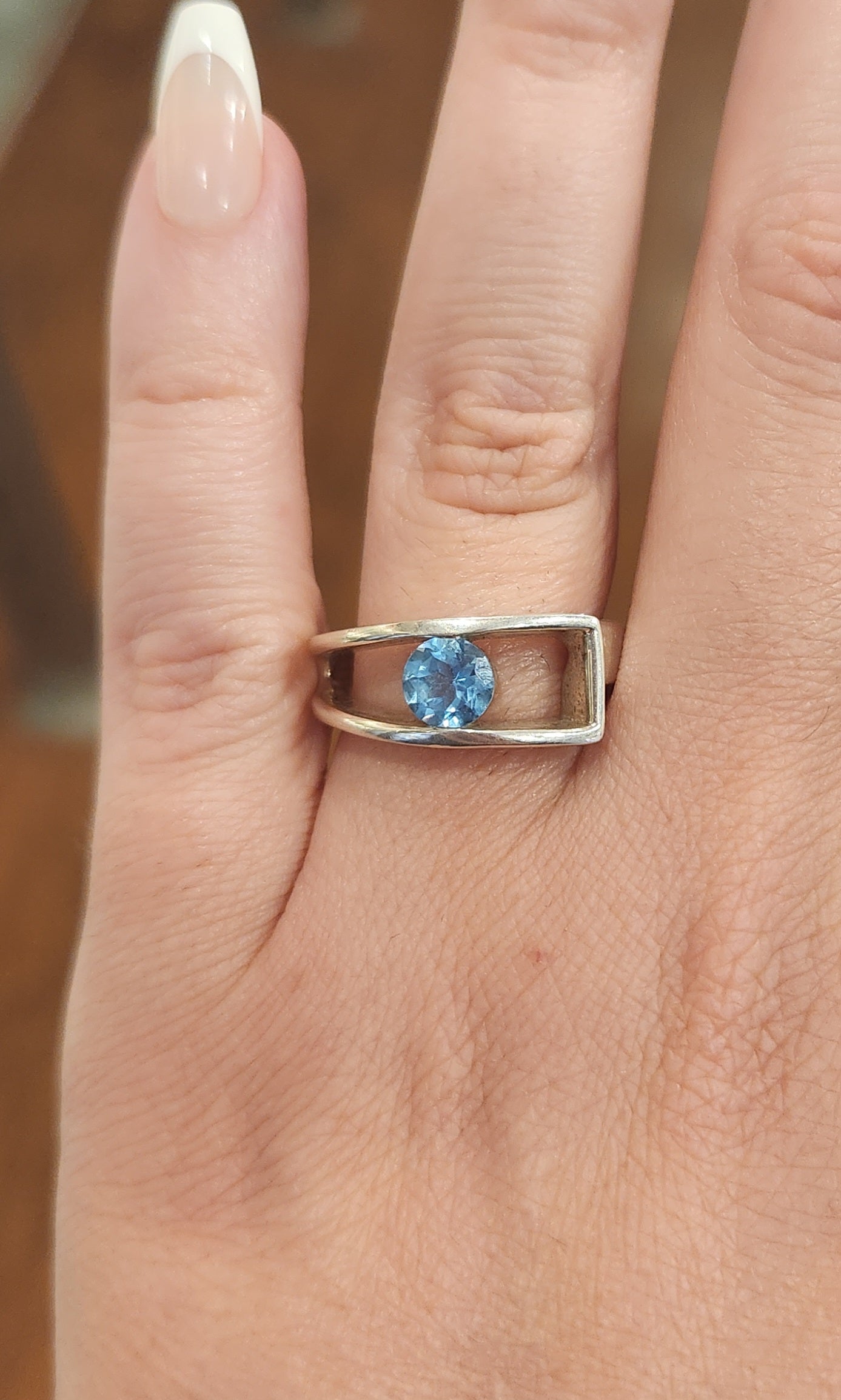 Sterling silver unique blue topaz ring