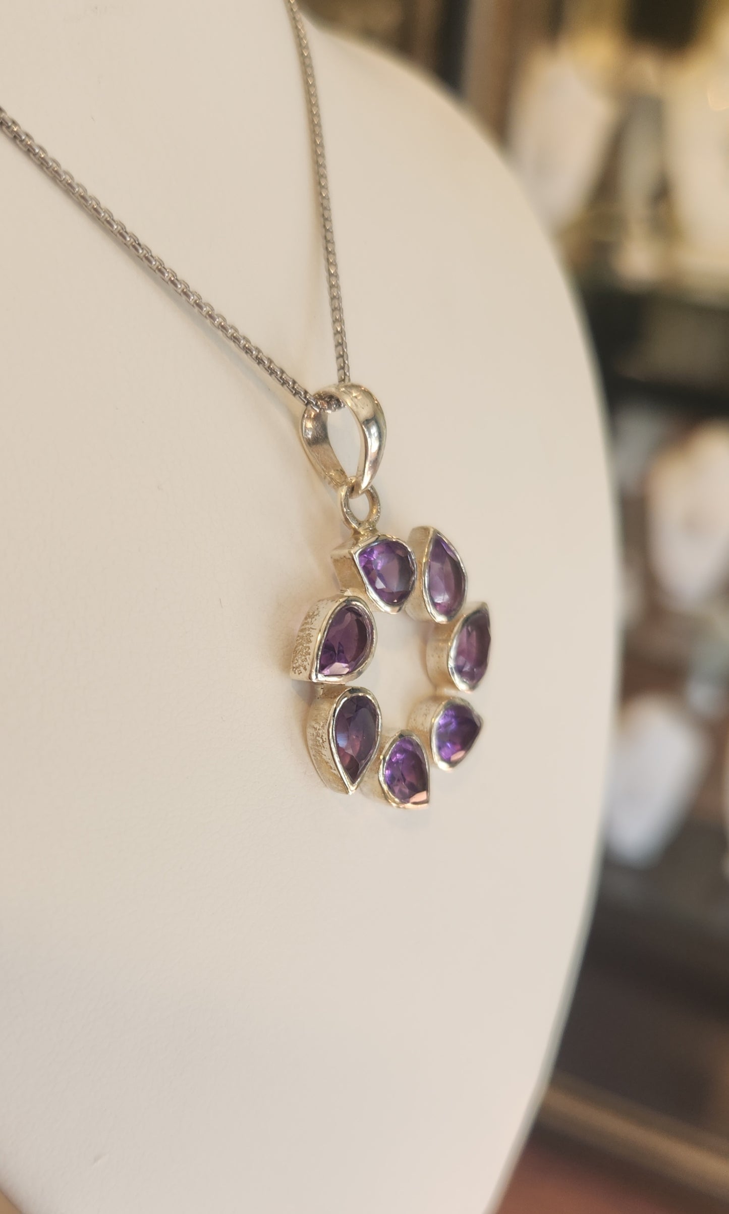 Sterling silver pear-shaped amethyst circle pendant