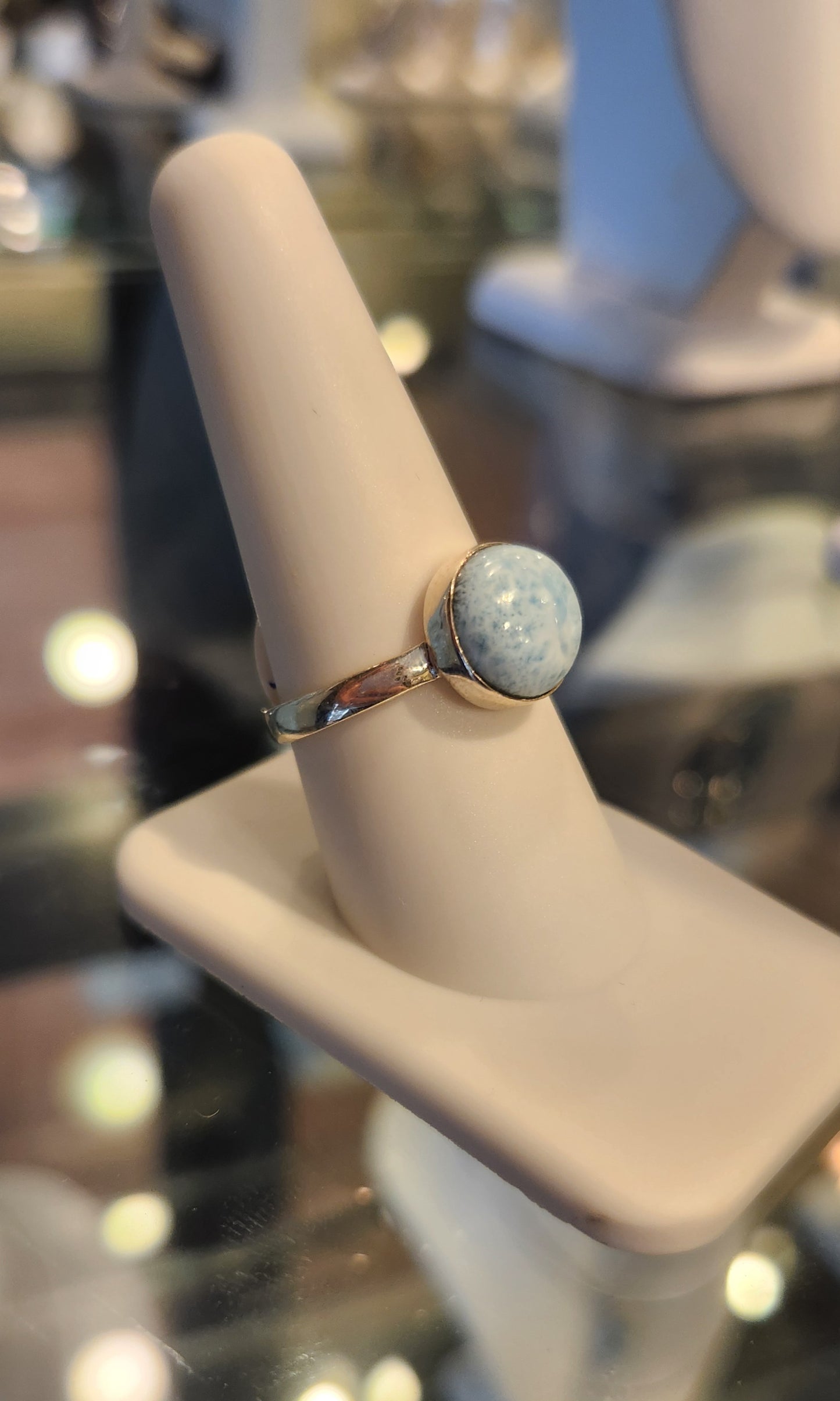 Sterling silver ring with round larimar cabochon