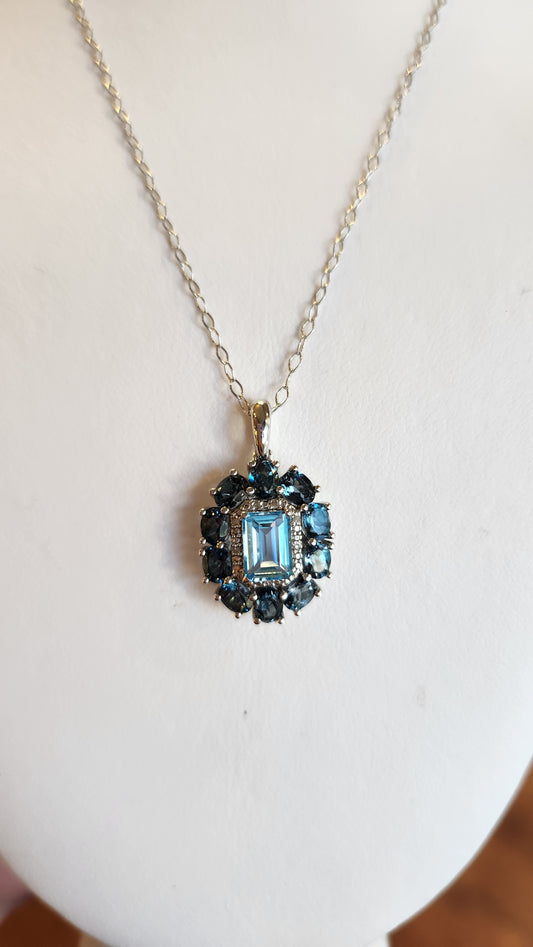 Sterling silver two-toned blue topaz pendant