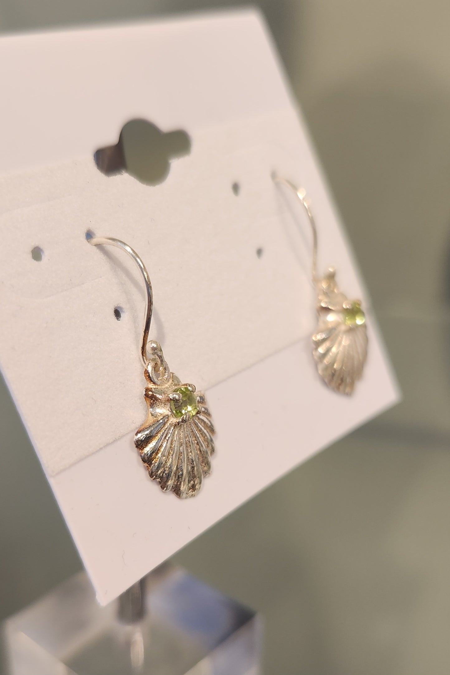 Sterling silver peridot seashell earrings