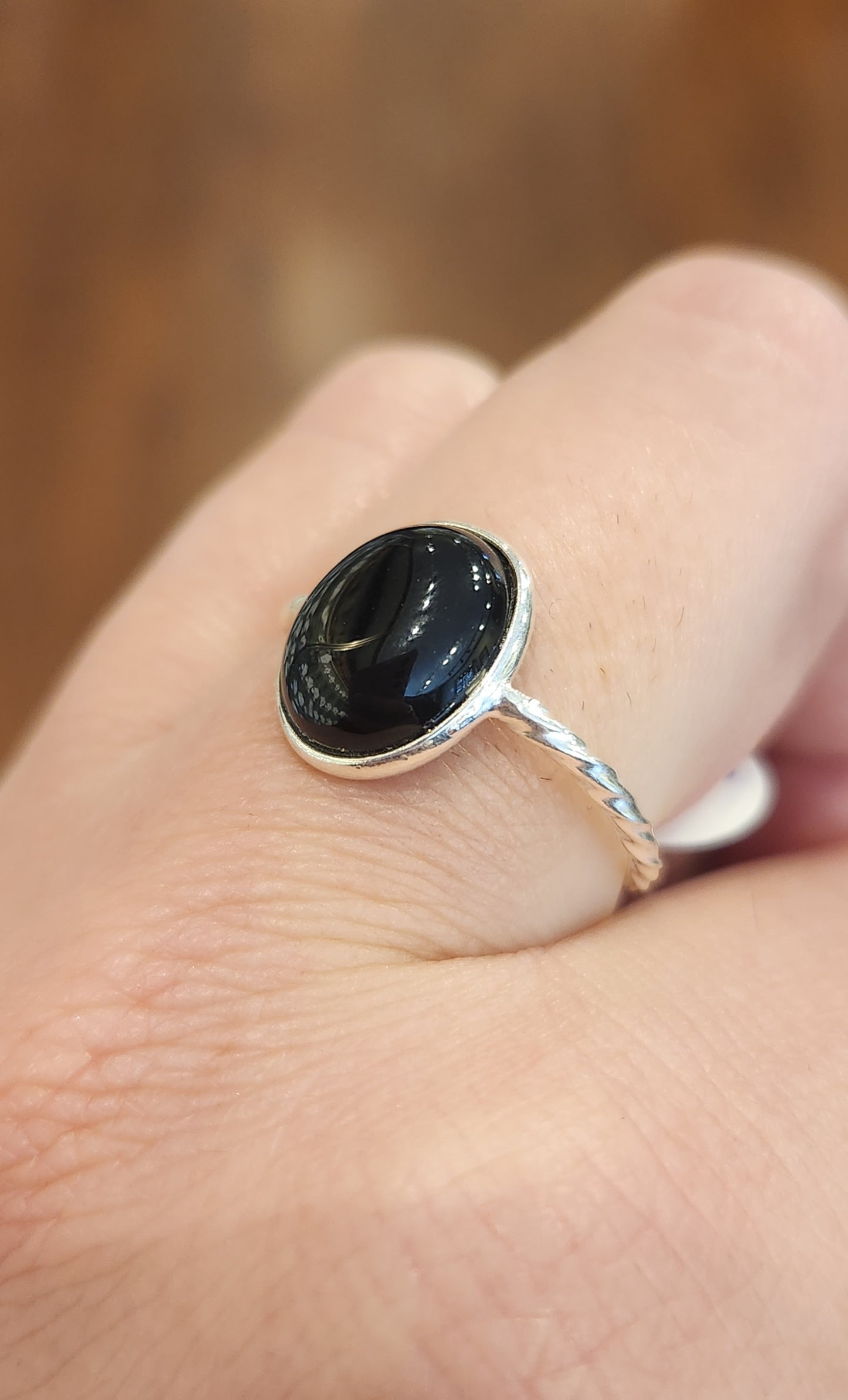 Sterling silver black onyx twisted band ring