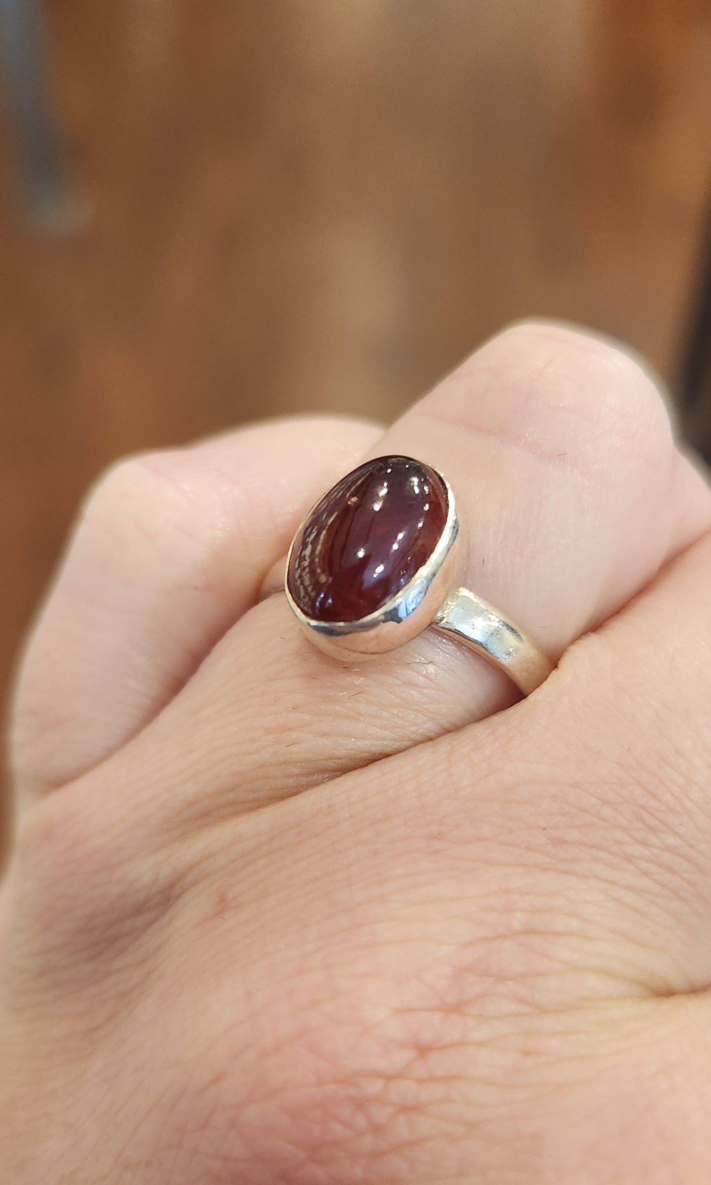 Sterling silver oval garnet bezel ring