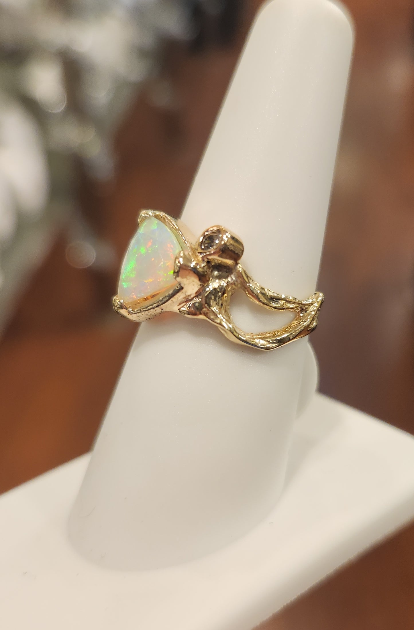 14k yellow gold trillian-cut opal ring with diamond