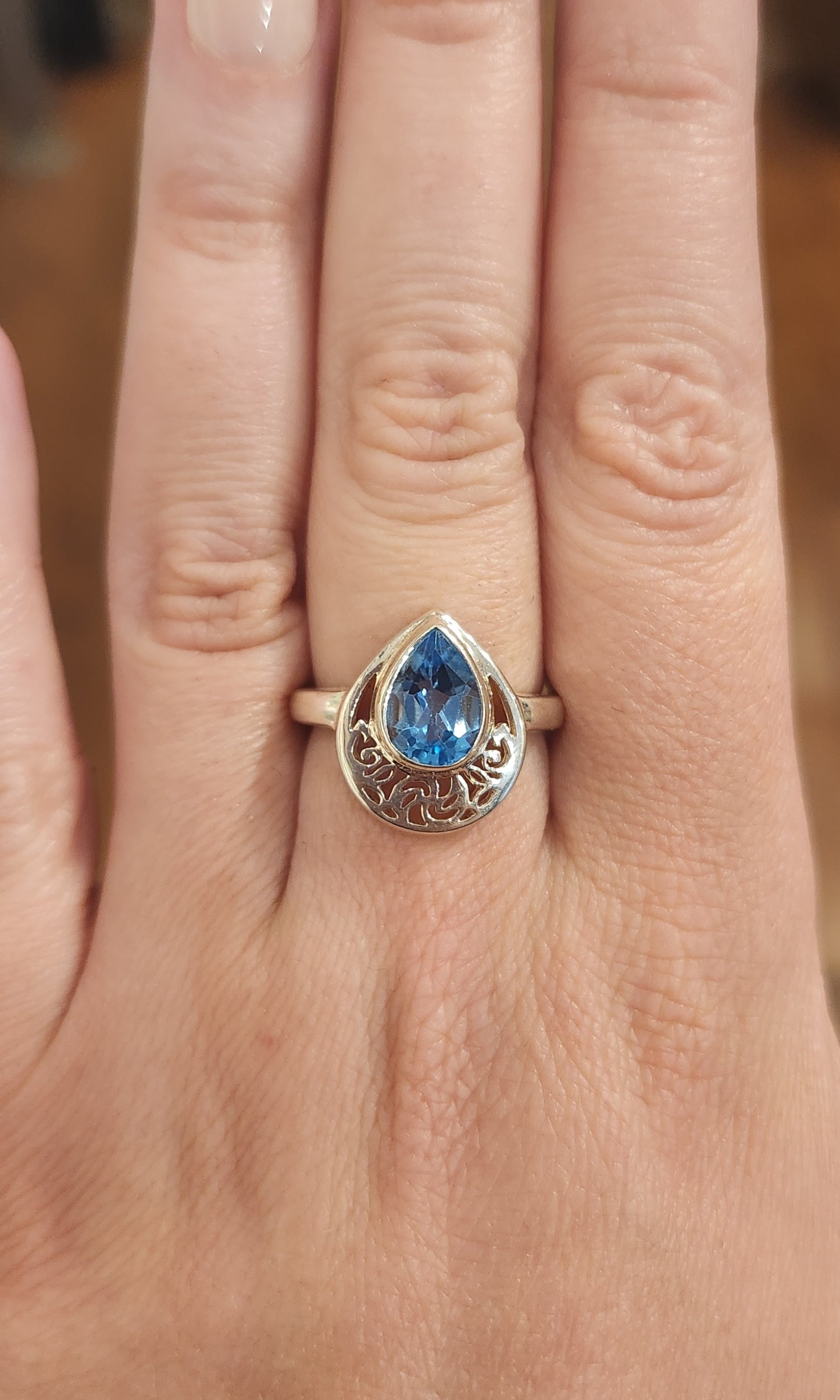 Sterling silver pear-shaped blue topaz filigree ring