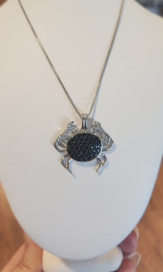 Sterling silver crab pendant with black & white diamonds