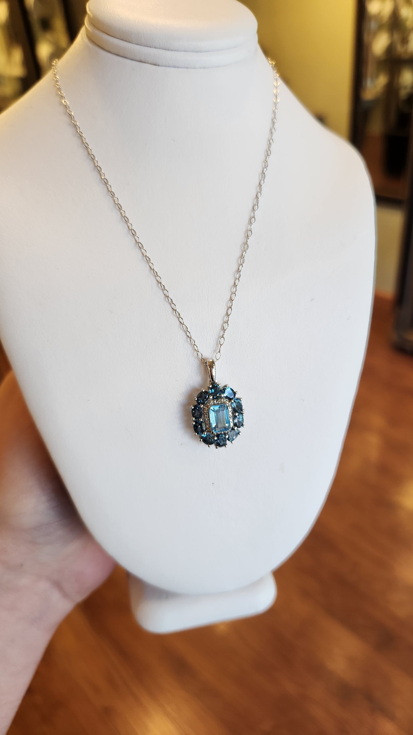 Sterling silver two-toned blue topaz pendant