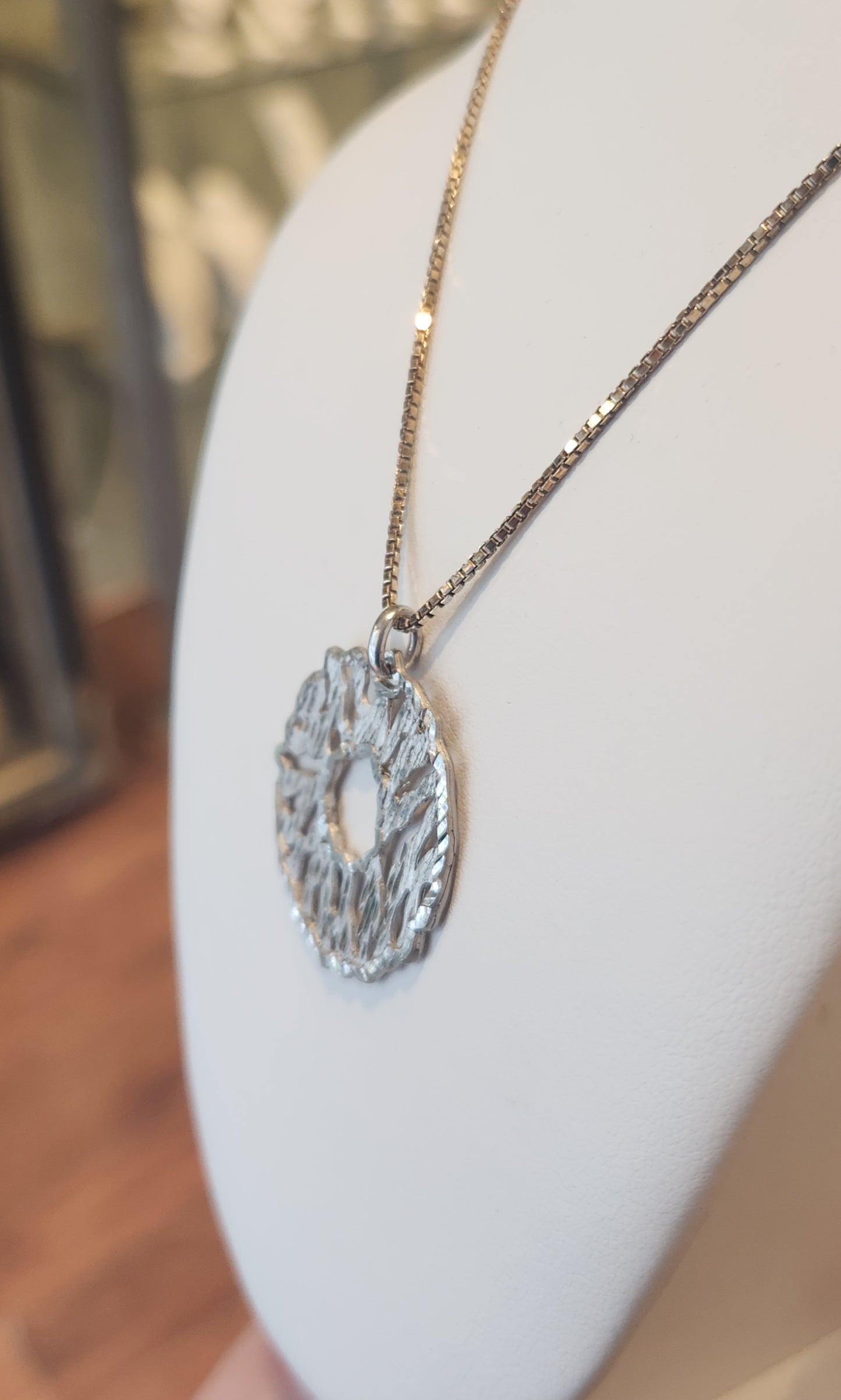 Sterling silver textured circle pendant