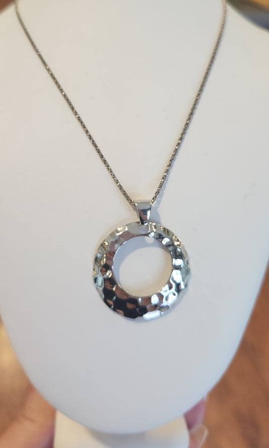 Sterling silver hammered circle pendant