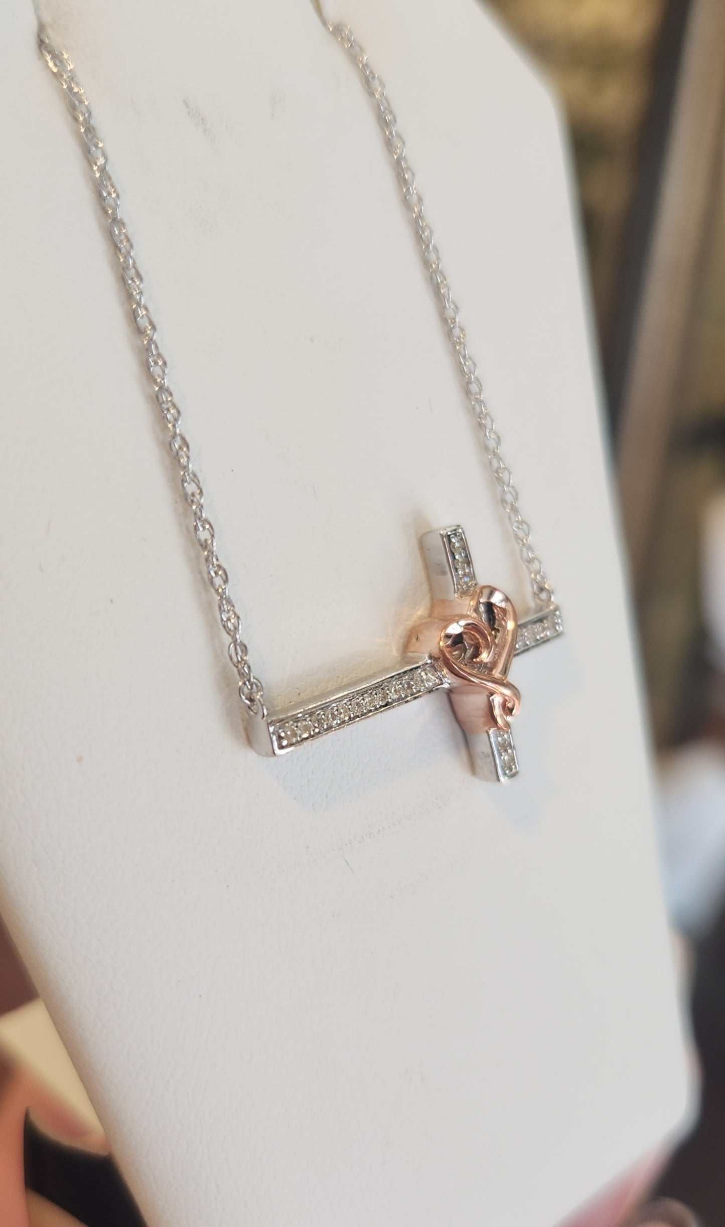 Sterling silver diamond sideways cross necklace with rose gold heart