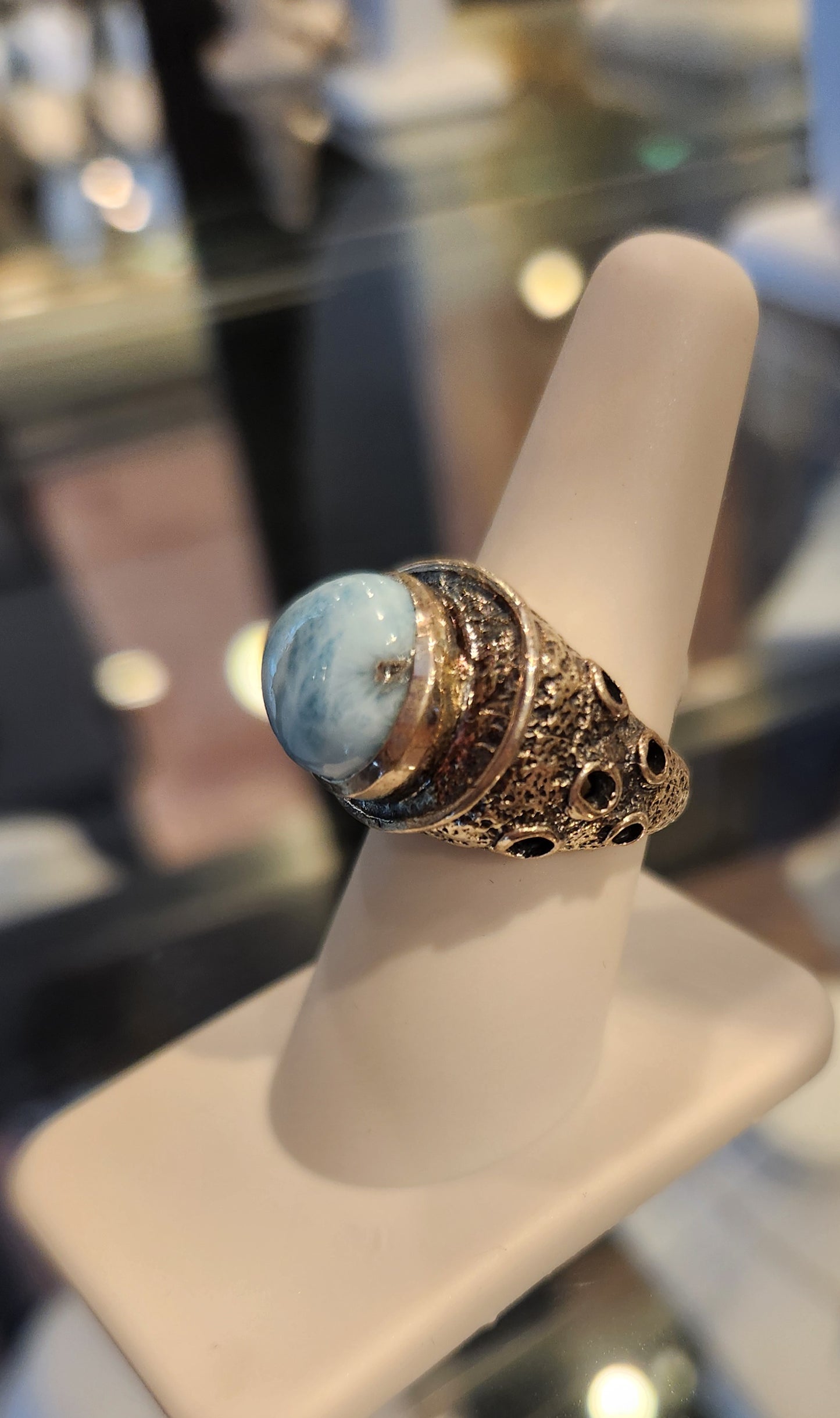 Sterling silver ring with sideways pear-shaped larimar cabochon