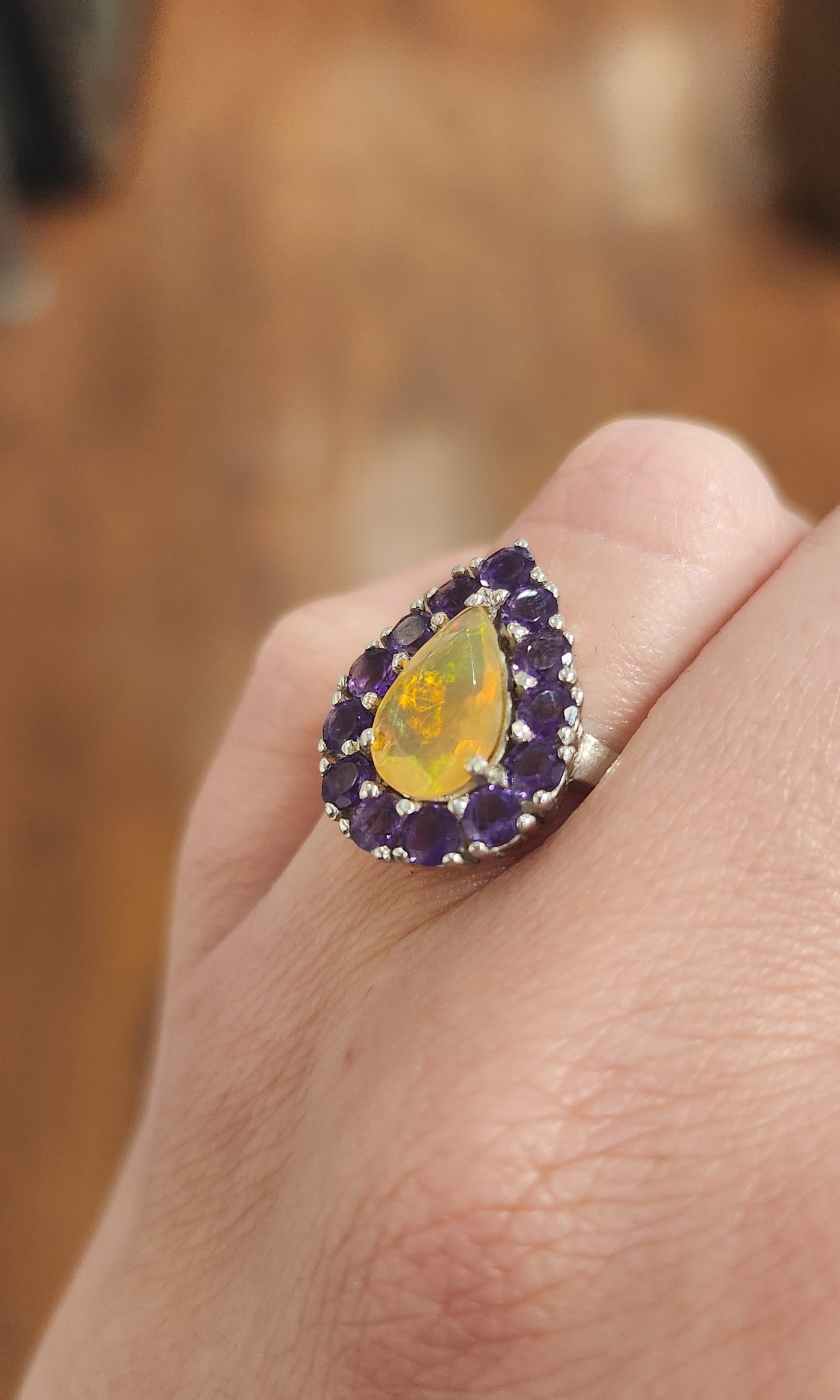 Sterling silver welo opal ring with amethyst