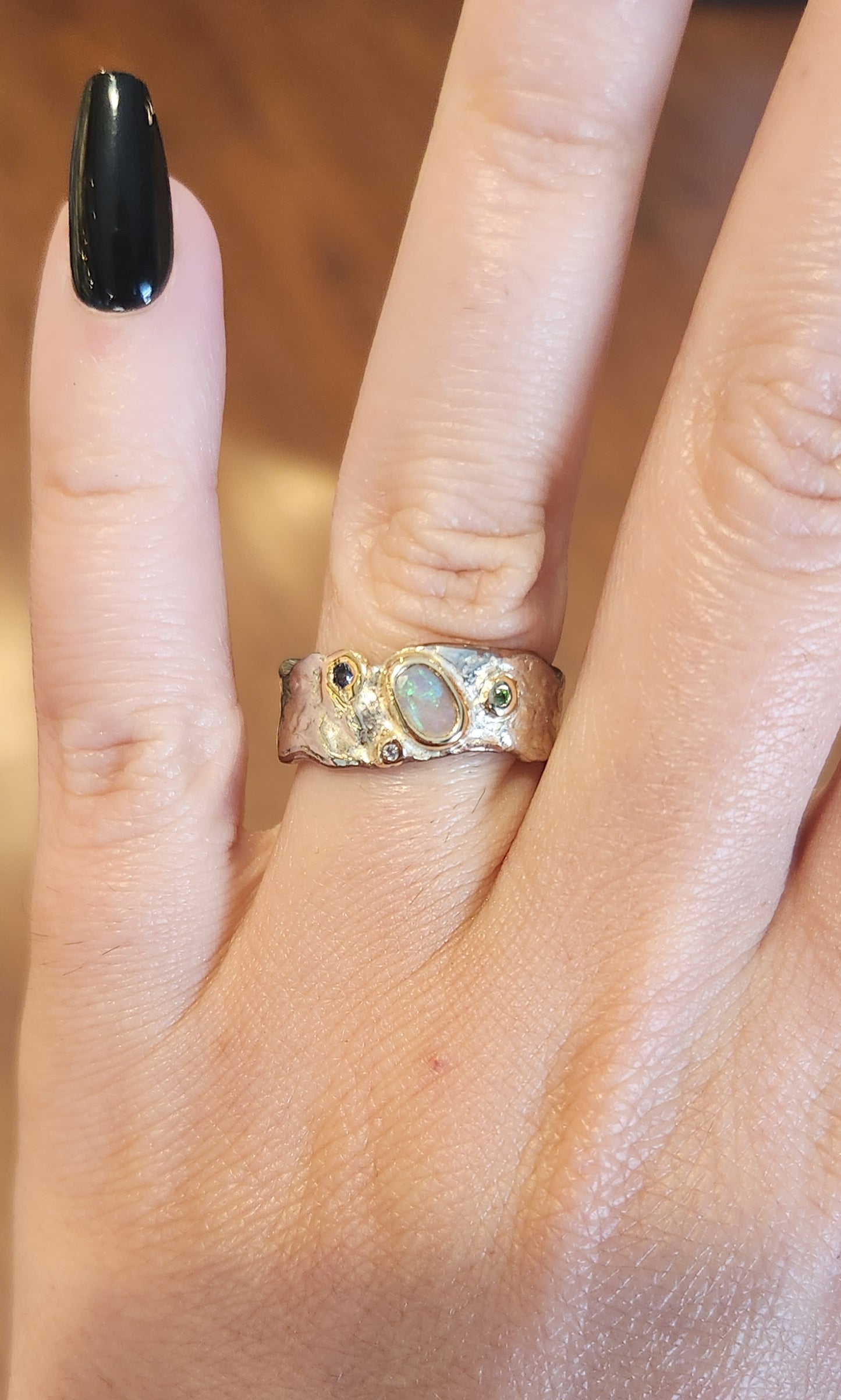 Sterling silver with 14k gold sapphire and diamond opal band