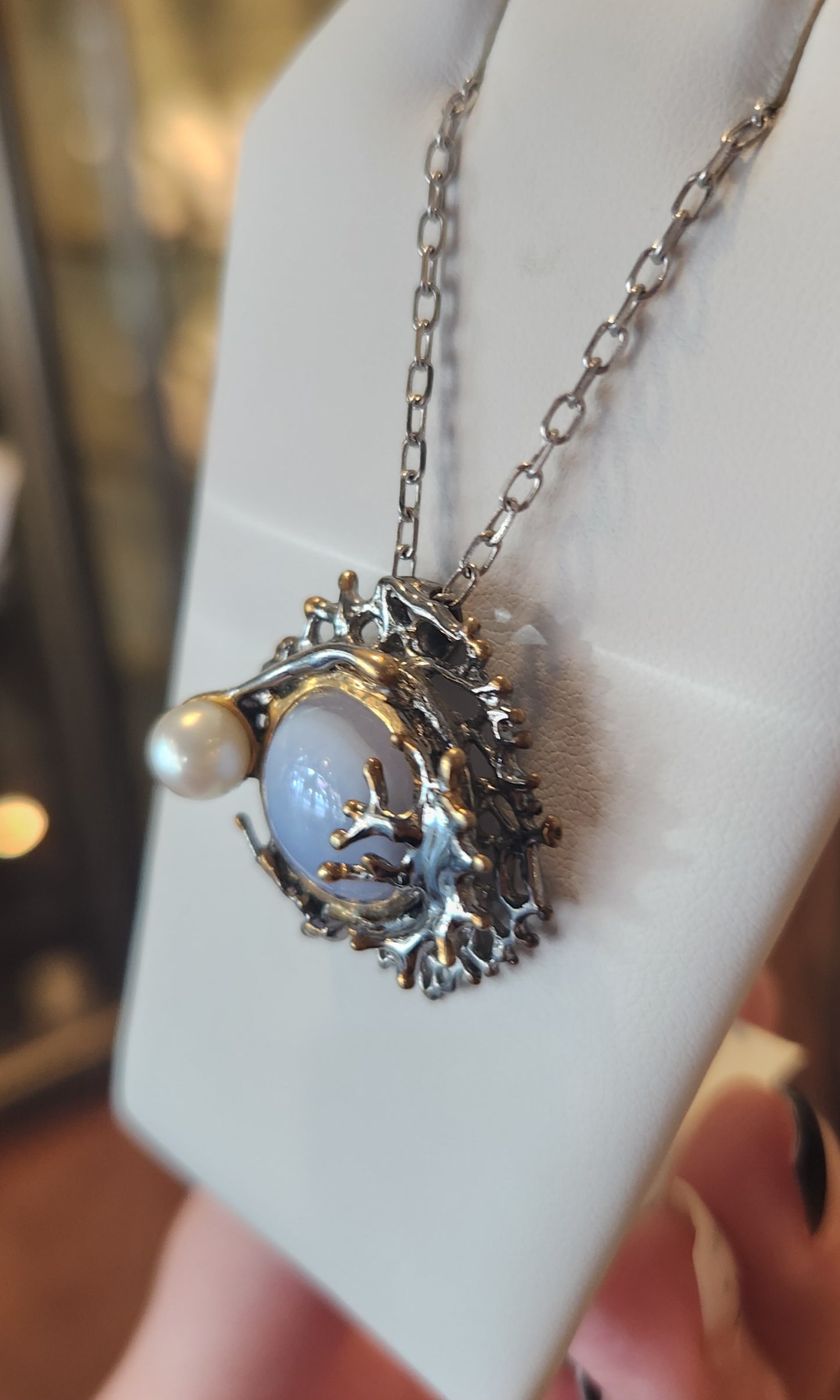 Sterling silver "birds nest" agate and pearl pendant