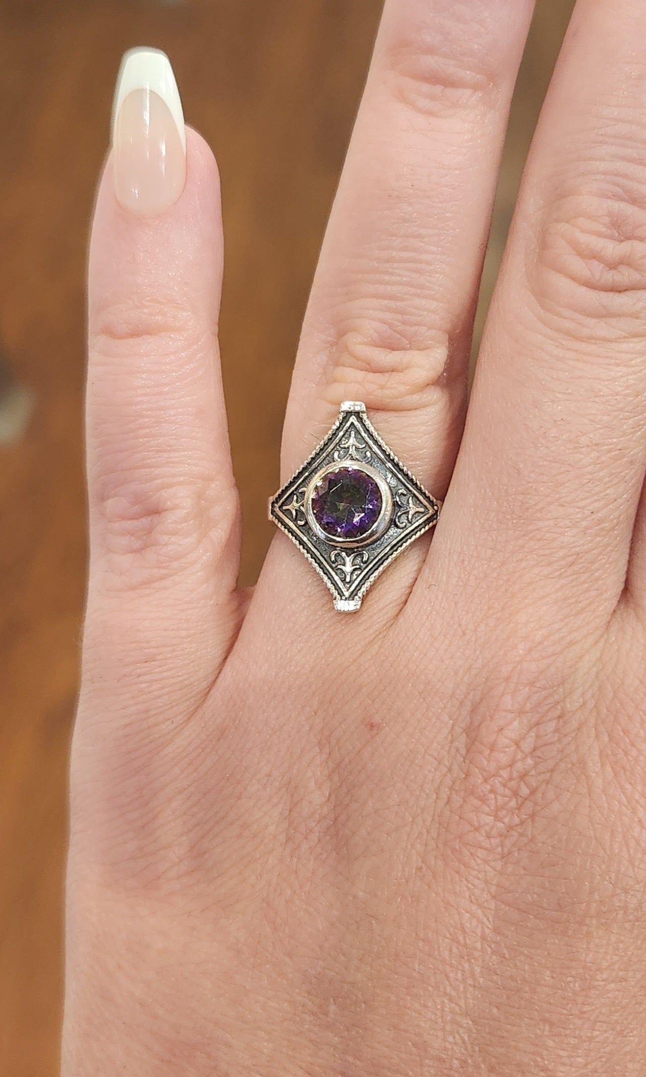 Sterling silver mystic topaz saddle ring