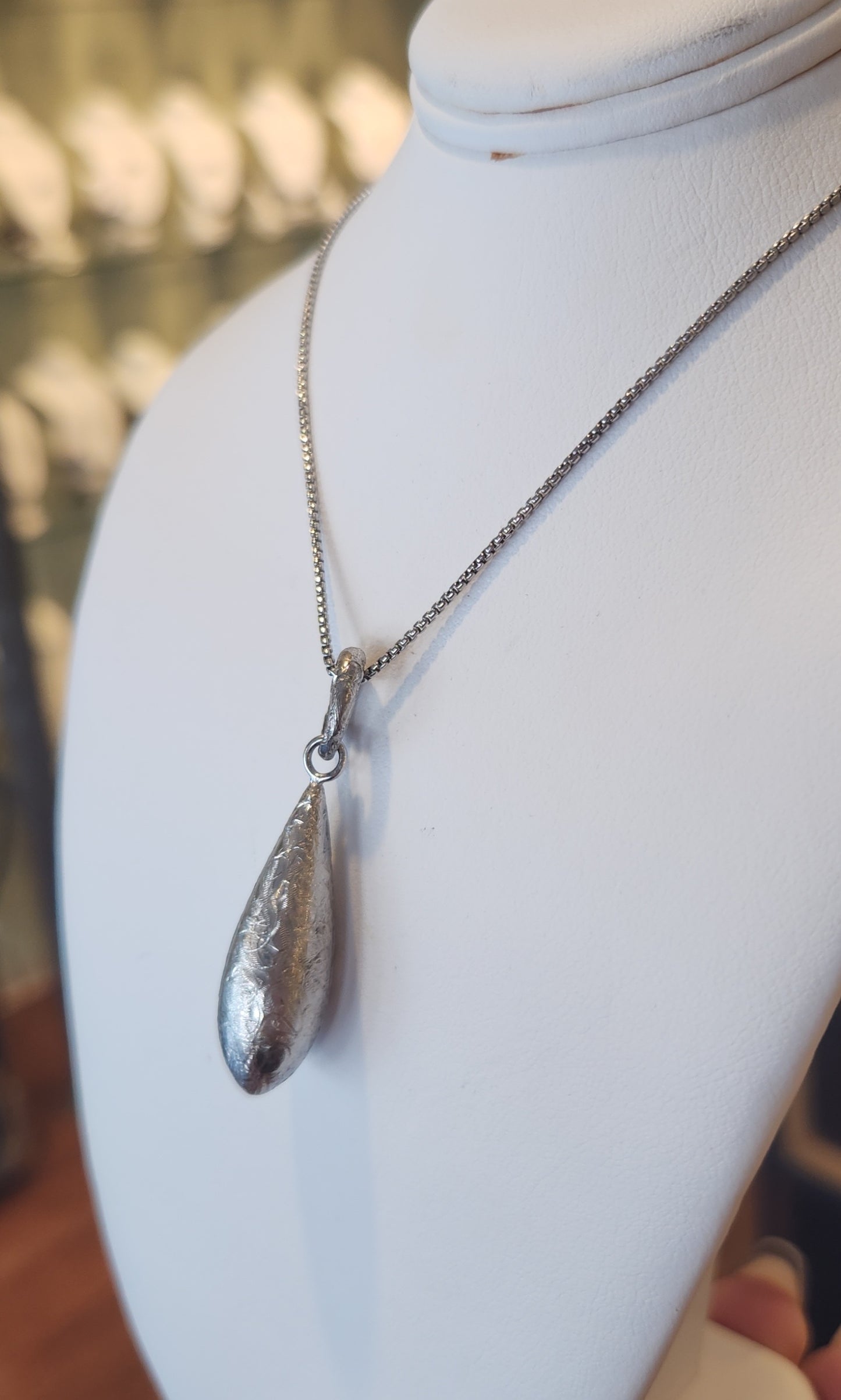 Sterling silver textured teardrop pendant