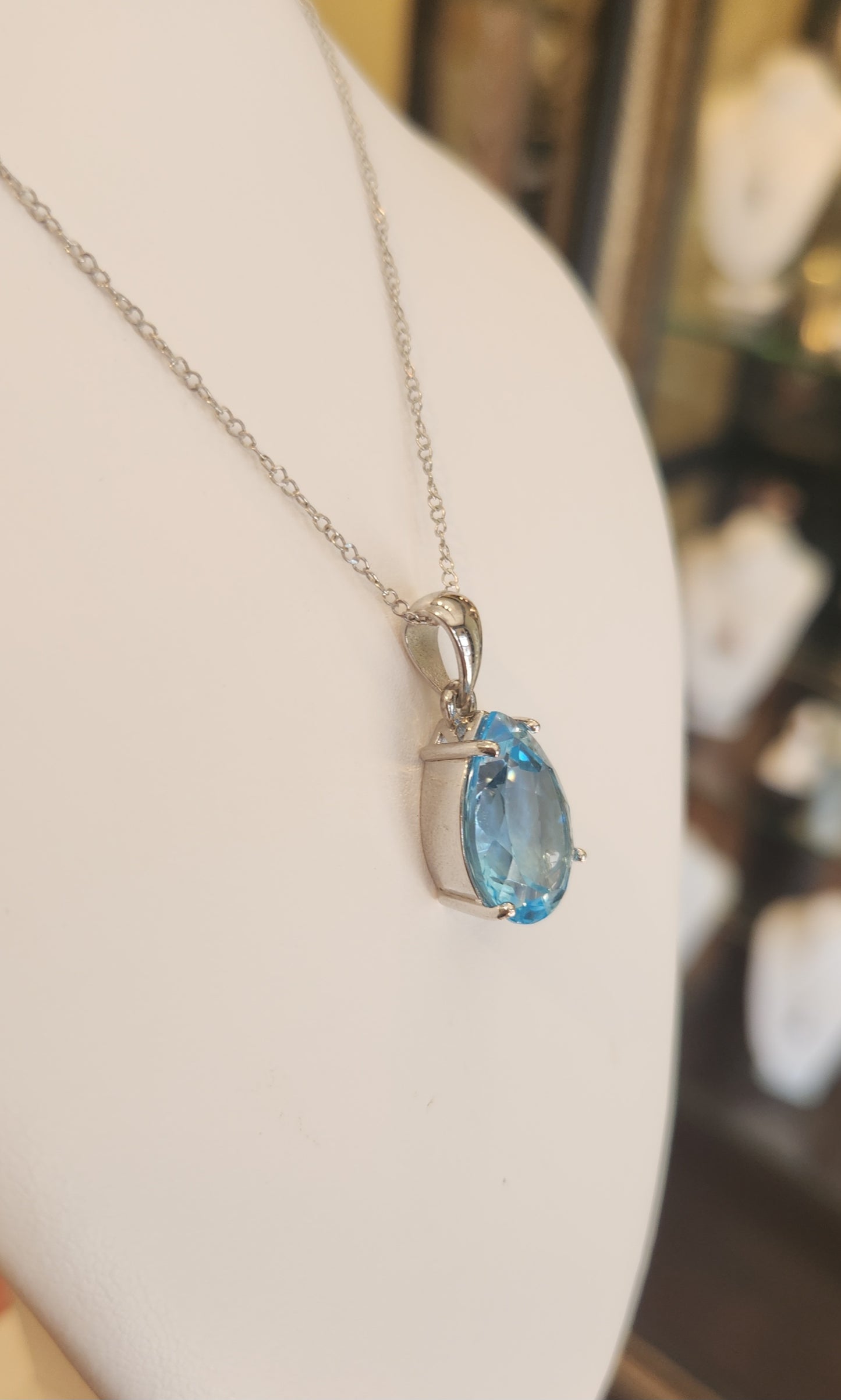 Sterling silver pear-shaped blue topaz pendant