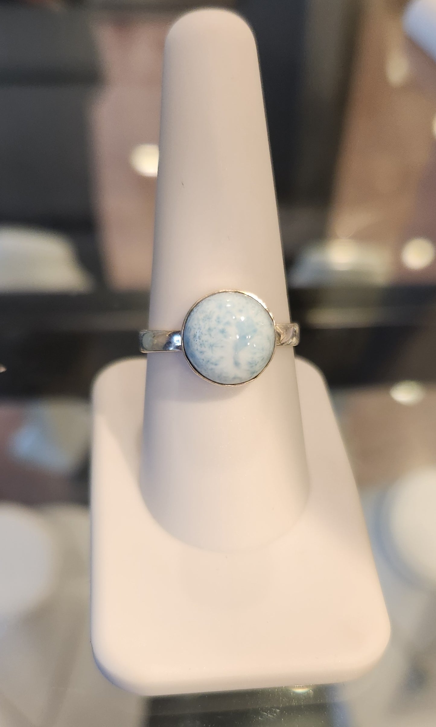 Sterling silver ring with round larimar cabochon