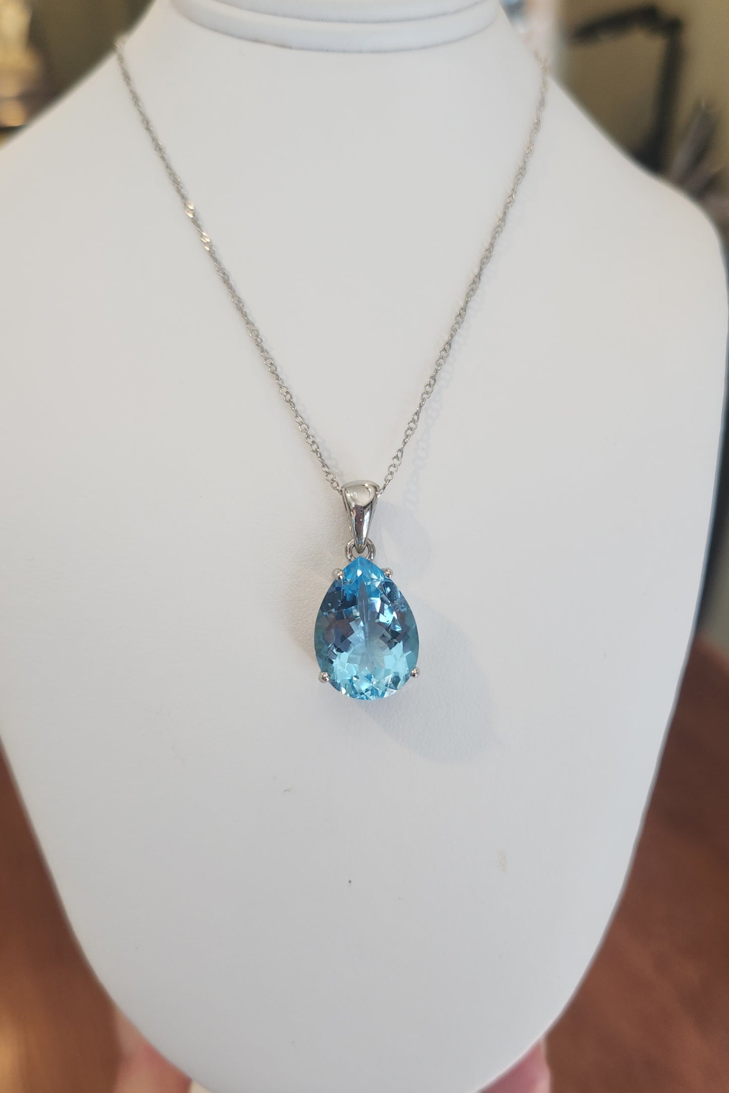 Sterling silver pear-shaped blue topaz pendant