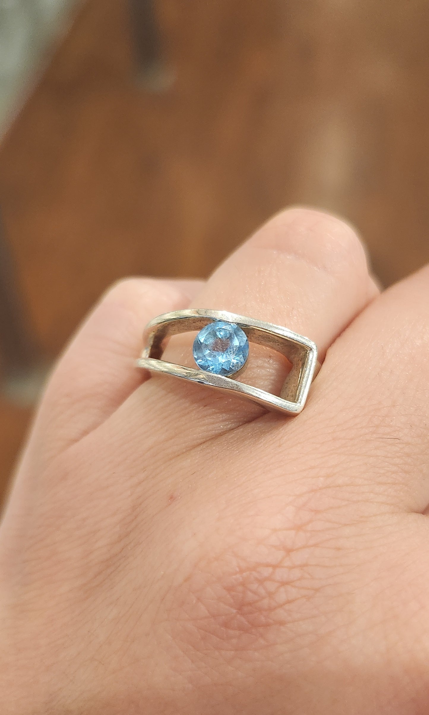 Sterling silver unique blue topaz ring