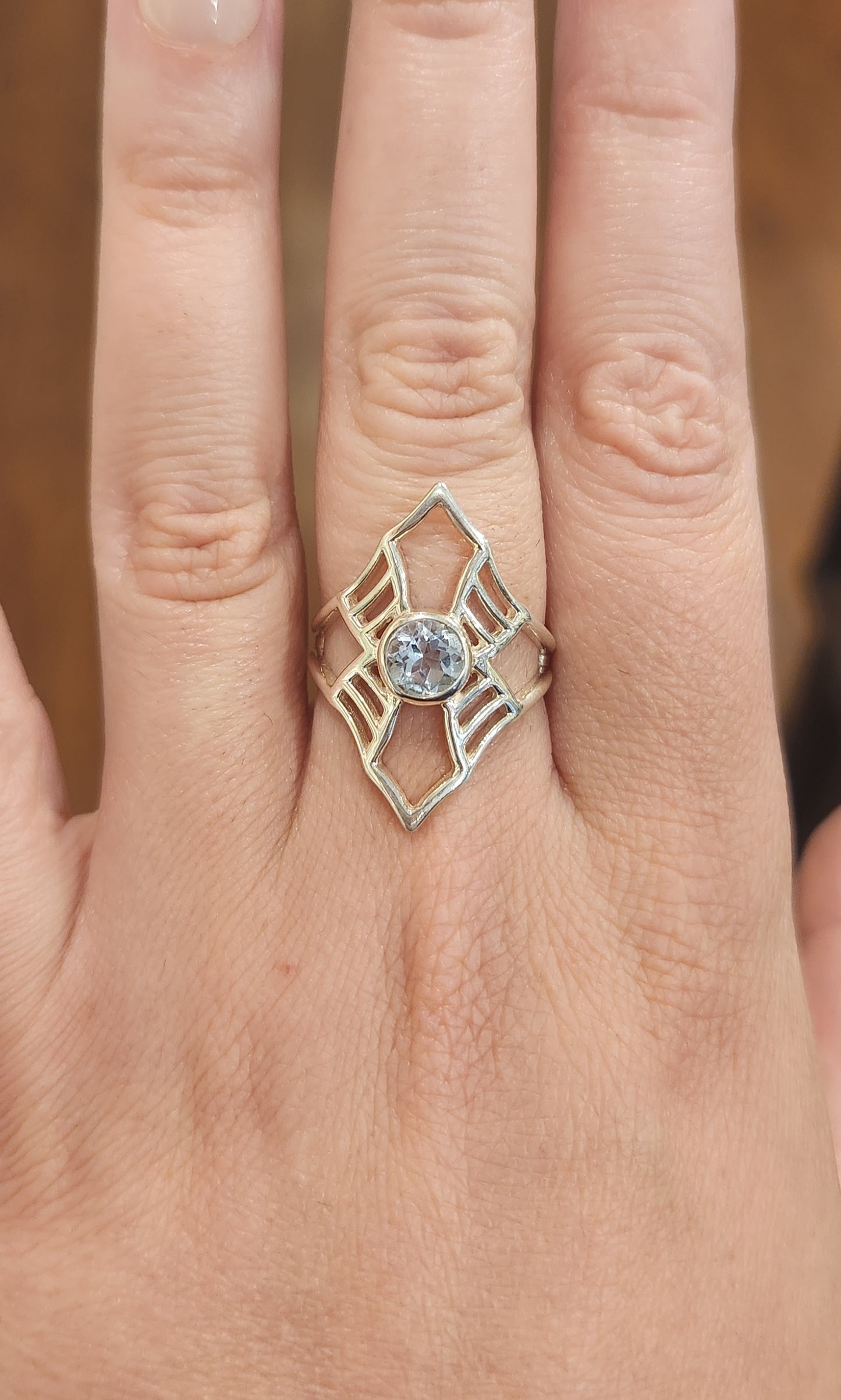 Sterling silver blue topaz spider-web ring