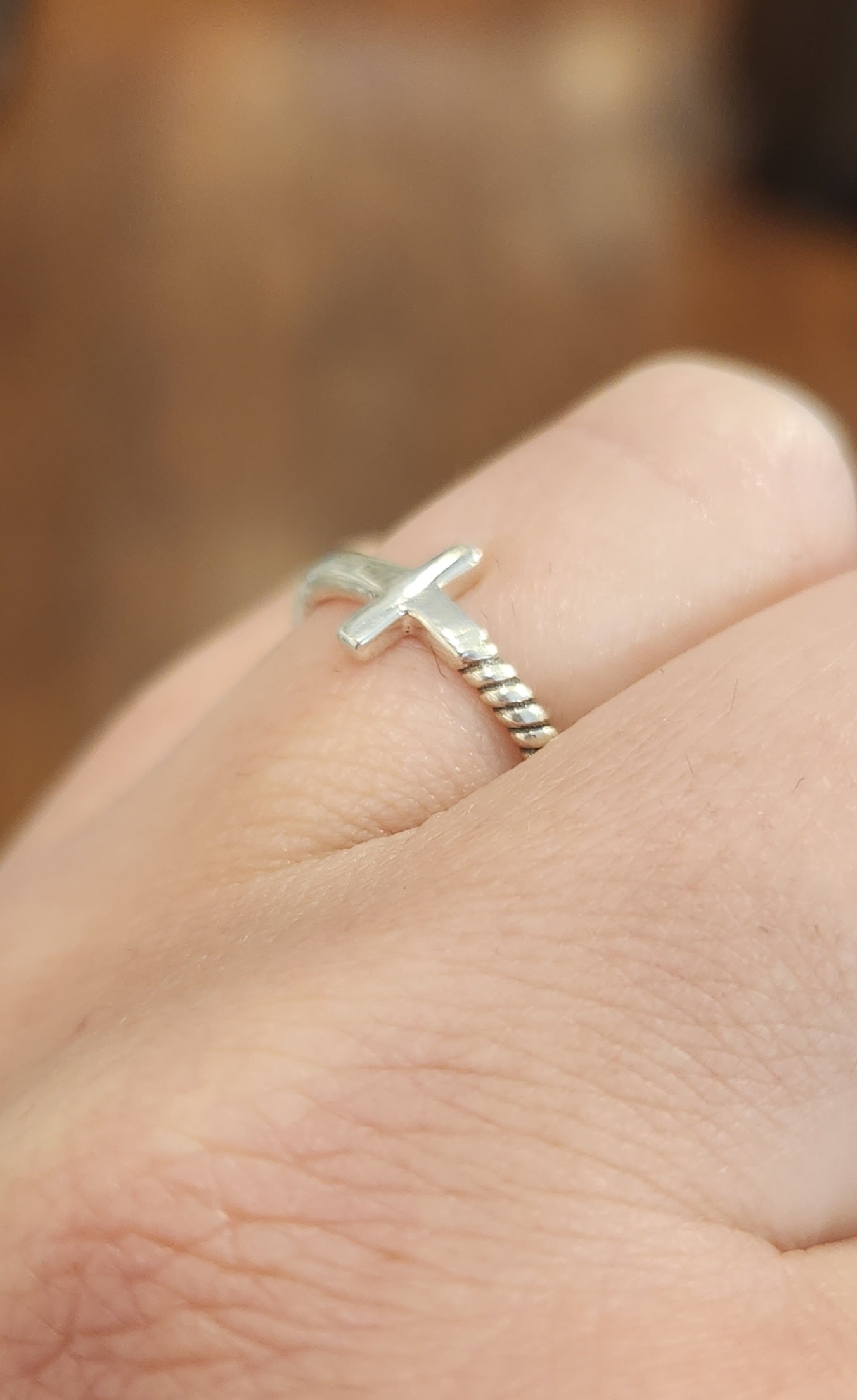 Sterling silver sideways cross ring with twisted band