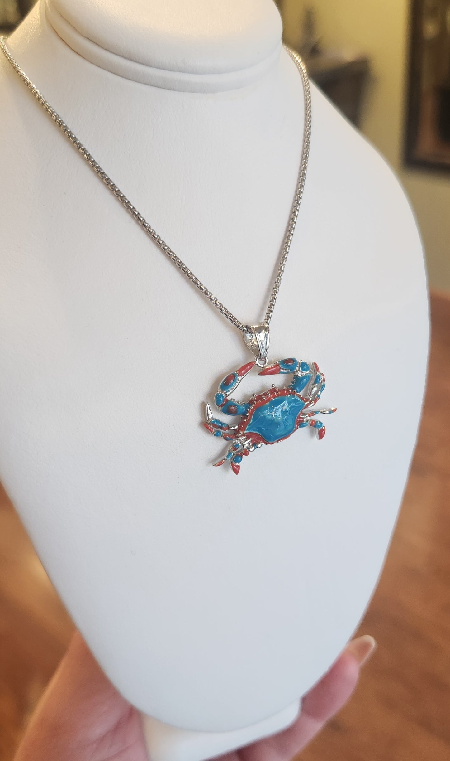 Sterling silver crab pendant with blue & red enamel