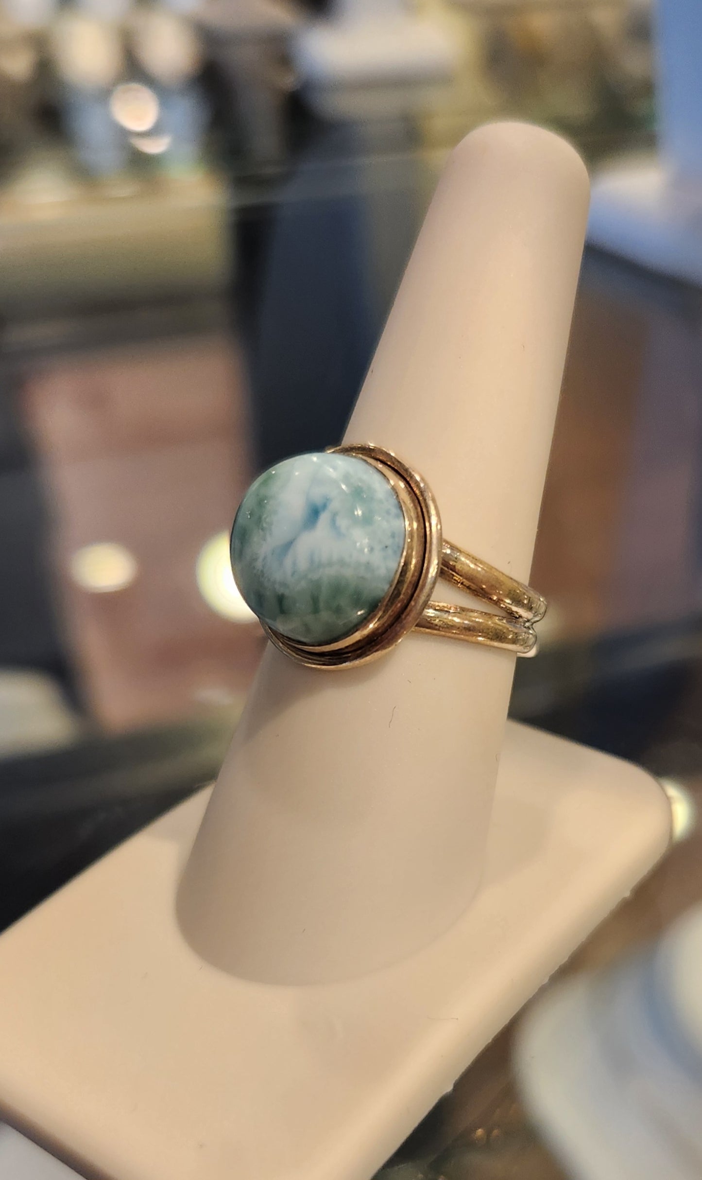 Sterling silver ring with round larimar cabochon