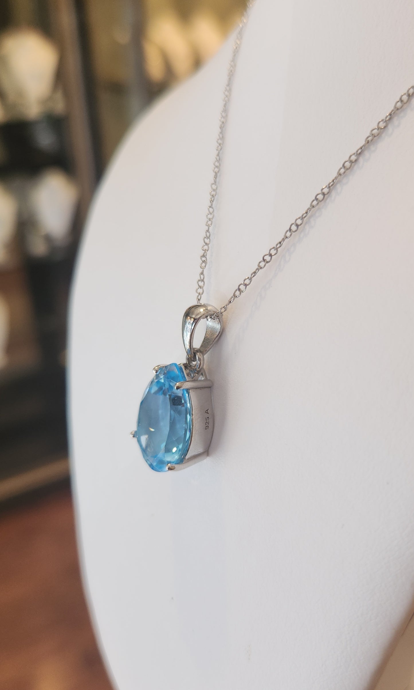 Sterling silver pear-shaped blue topaz pendant