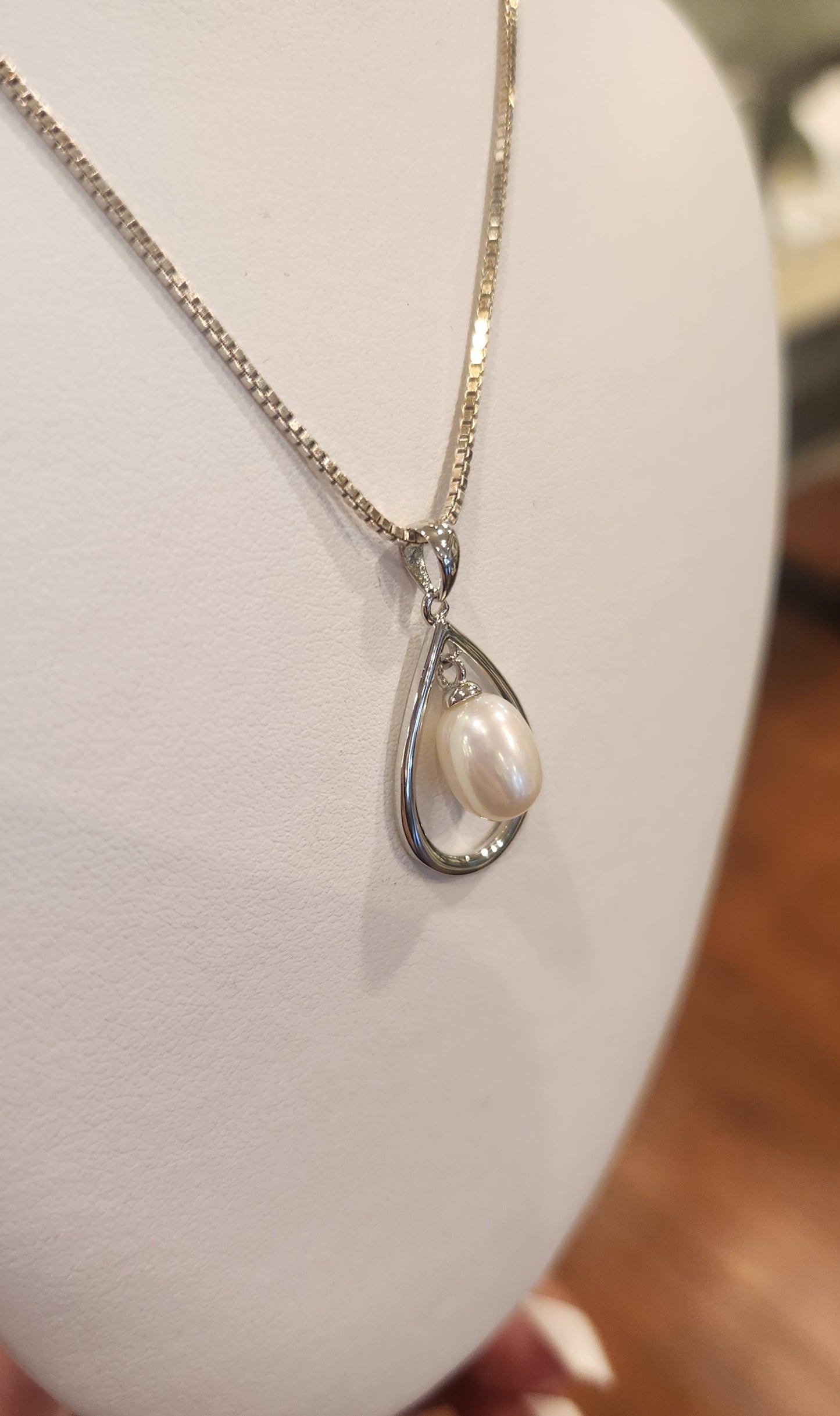 Sterling silver pendant with dangle pearl