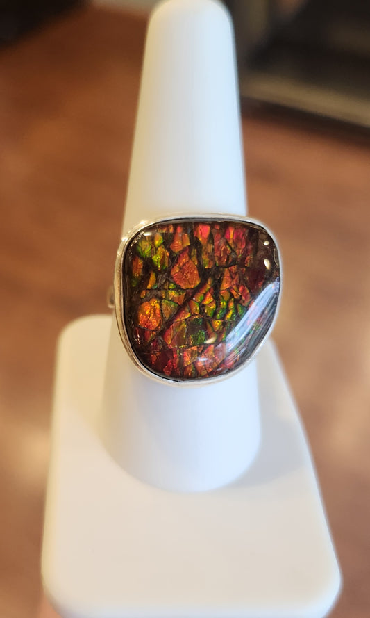 Sterling silver ammolite ring with orange/green flash