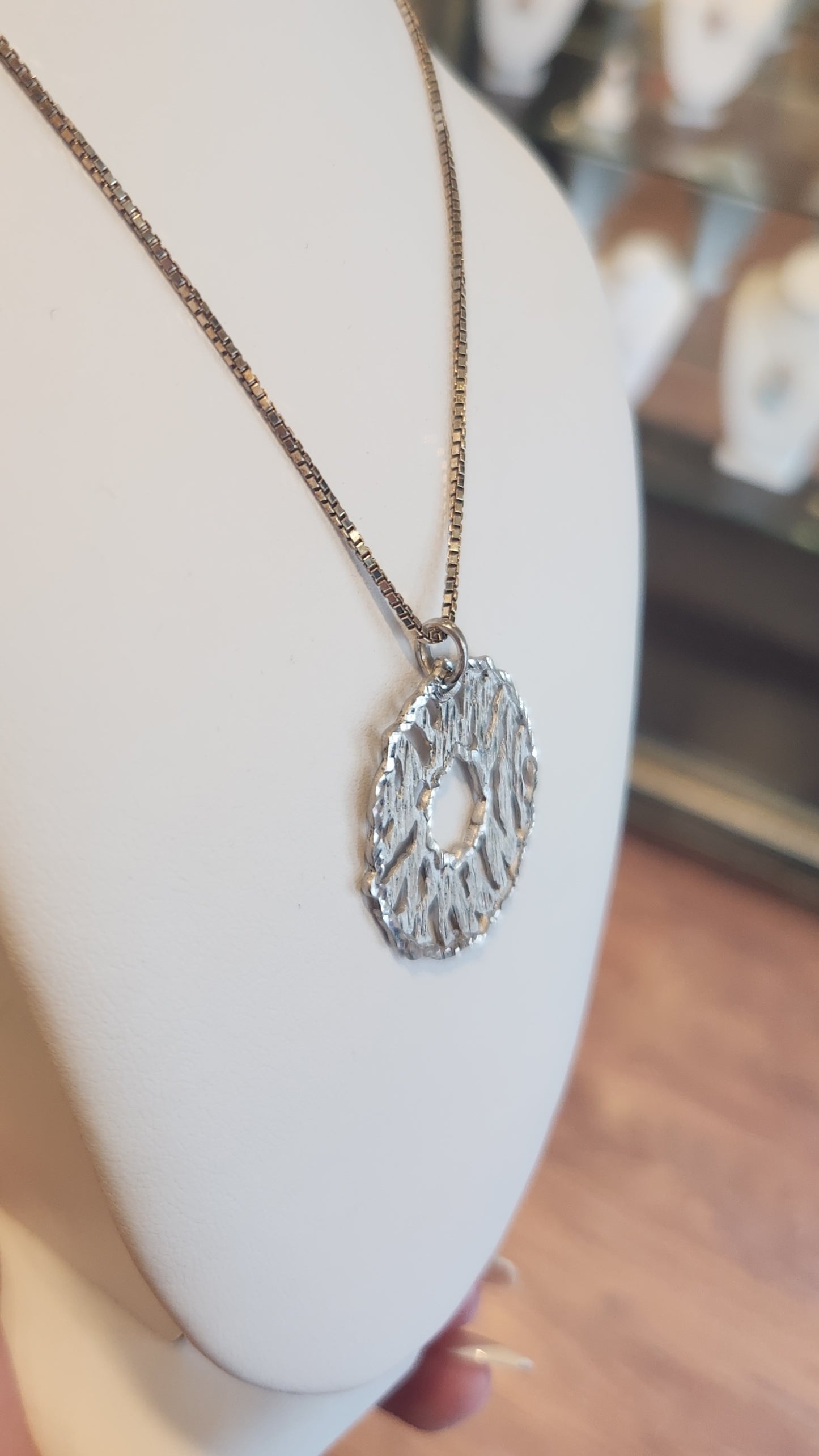 Sterling silver textured circle pendant