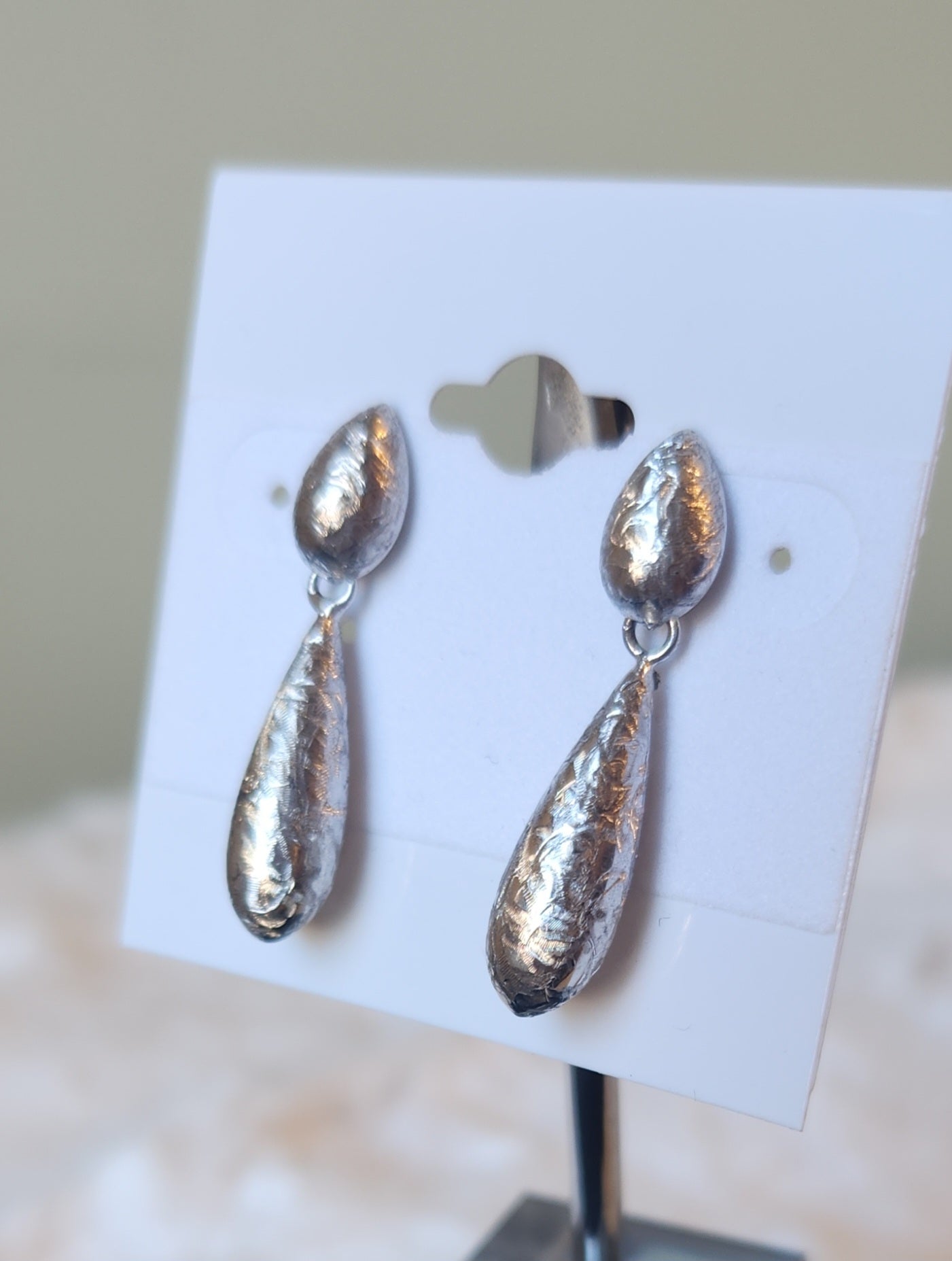 Sterling silver teardrop dangle textured earrings