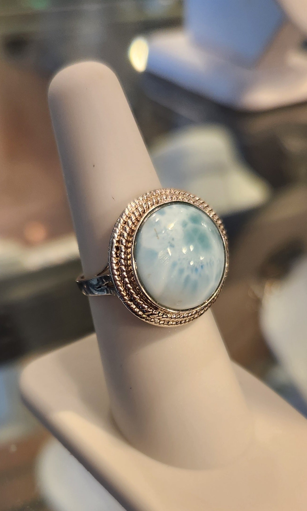 Sterling silver ring with round larimar cabochon