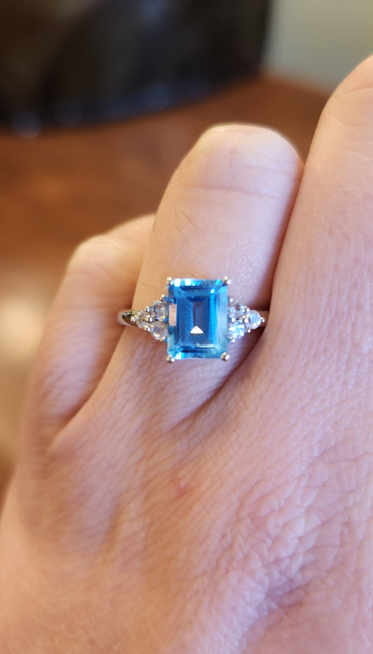 Sterling silver emerald-cut blue topaz ring