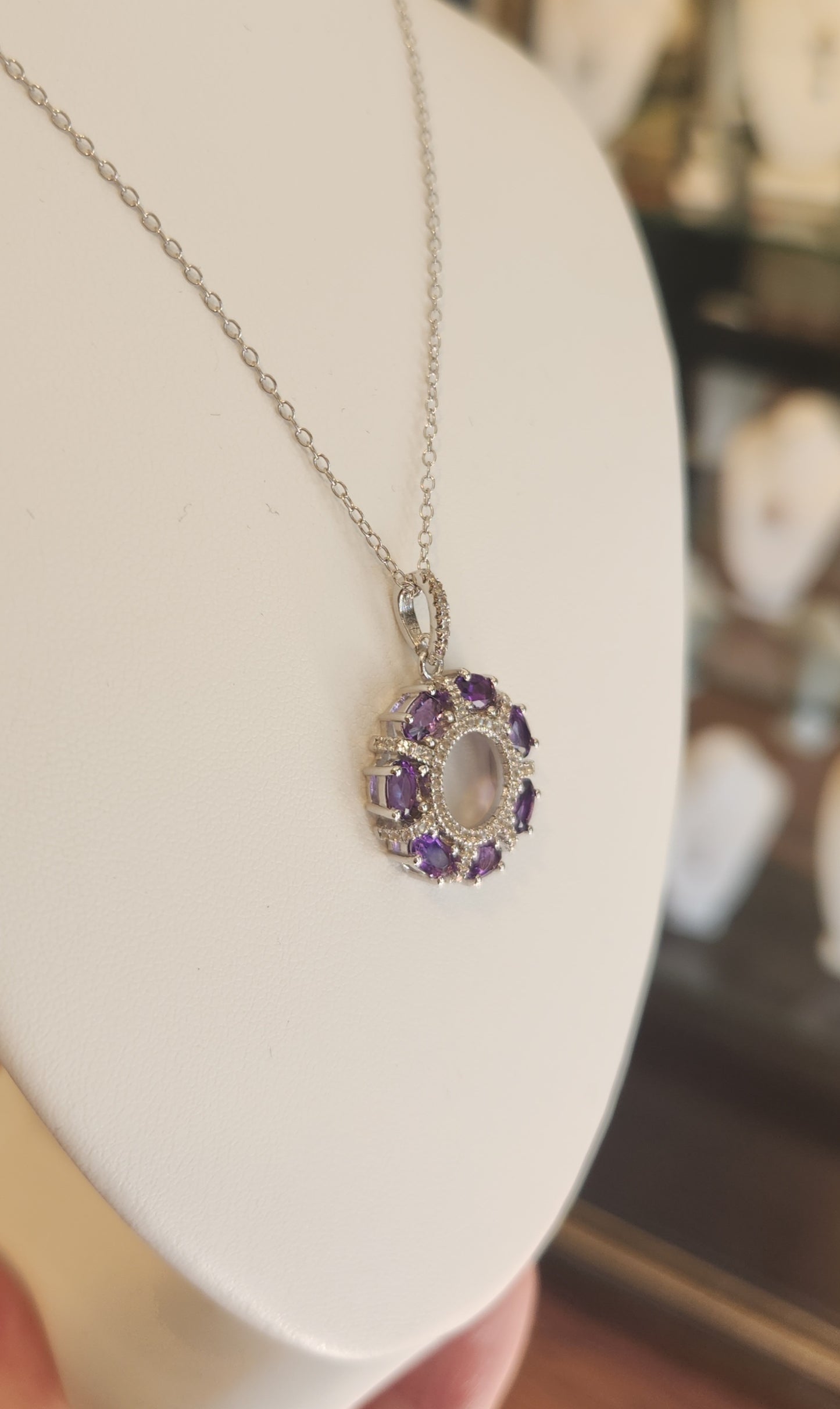 Sterling silver diamond and amethyst circle pendant