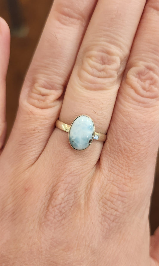 Sterling silver ring with oval larimar cabochon
