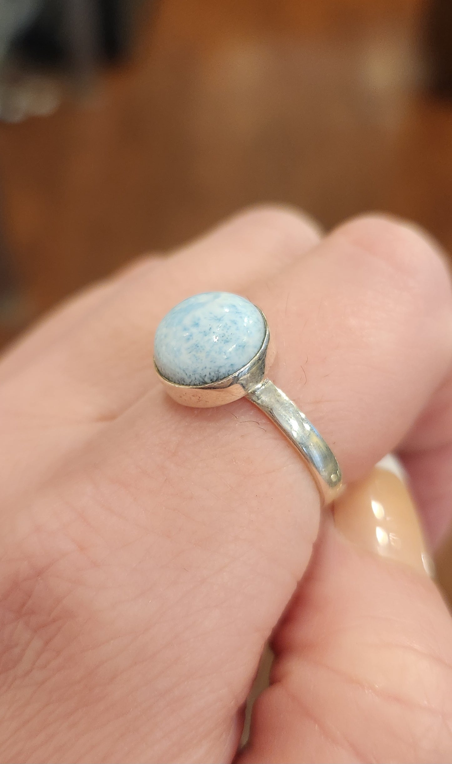 Sterling silver ring with round larimar cabochon