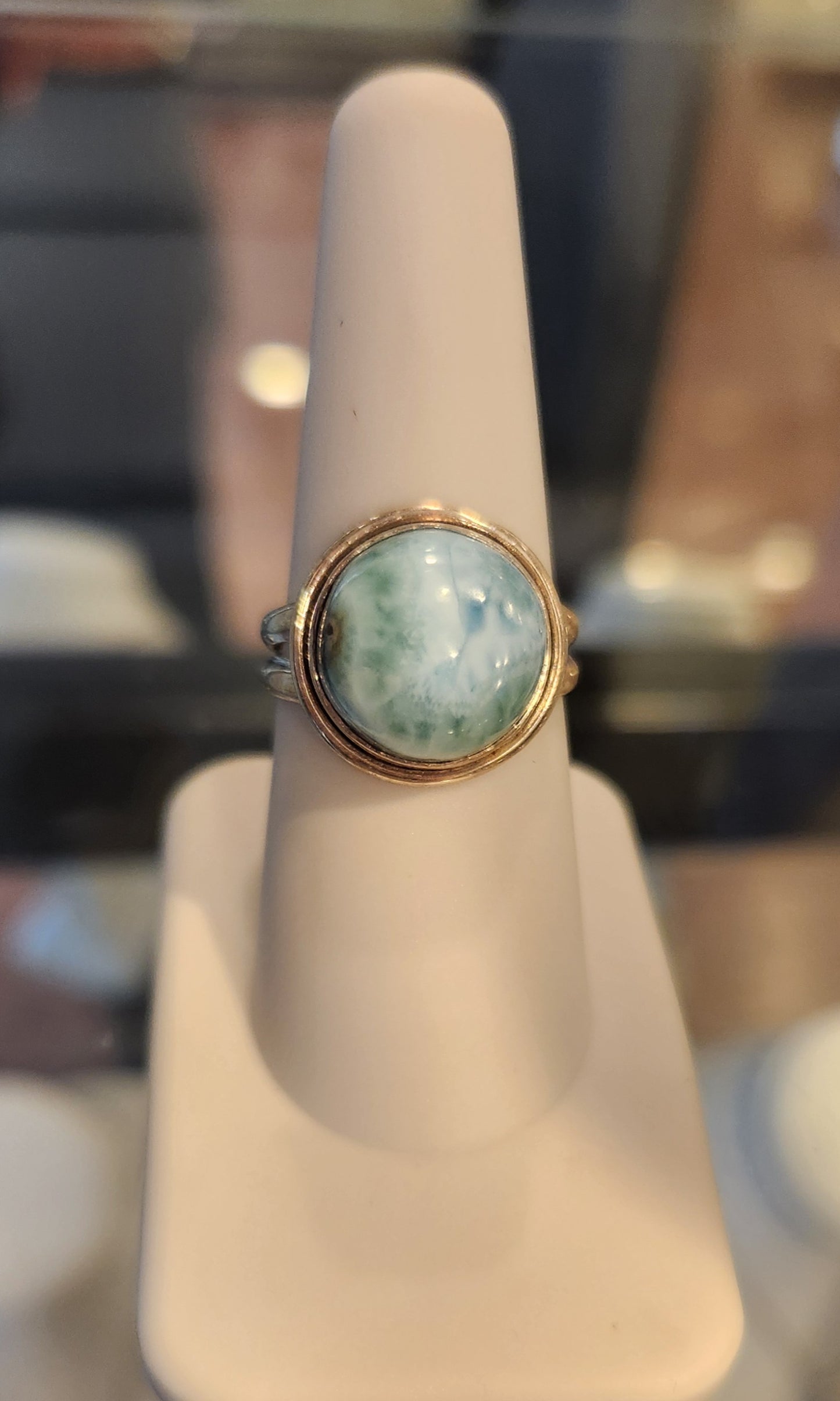 Sterling silver ring with round larimar cabochon