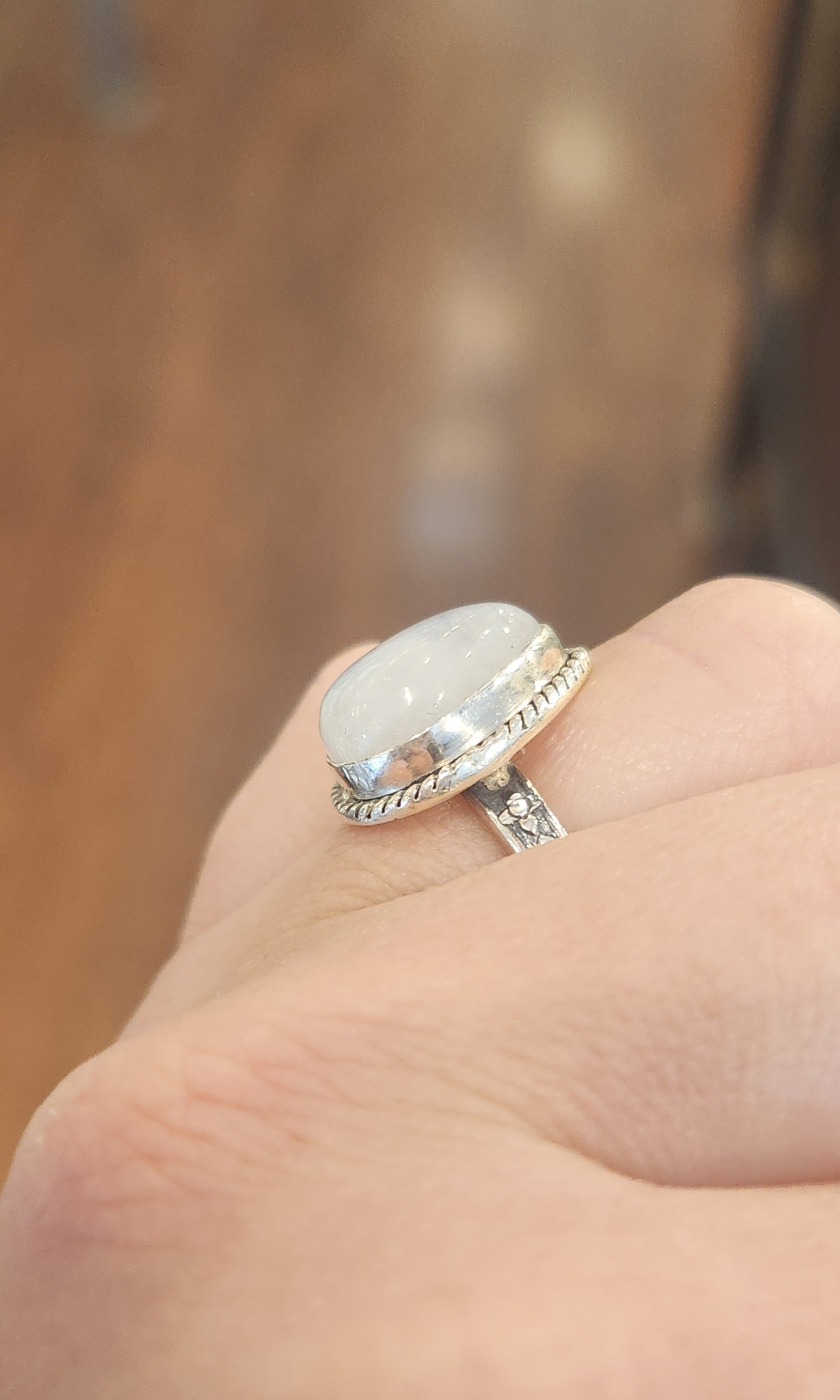 Sterling silver pear-shaped rainbow moonstone ring with unique band