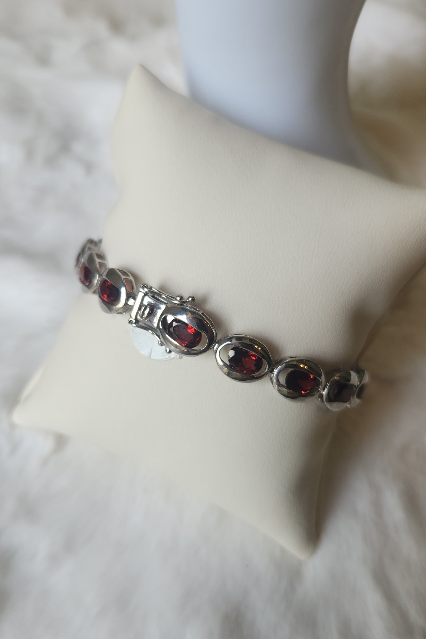 Sterling silver floating bezel garnet tennis bracelet