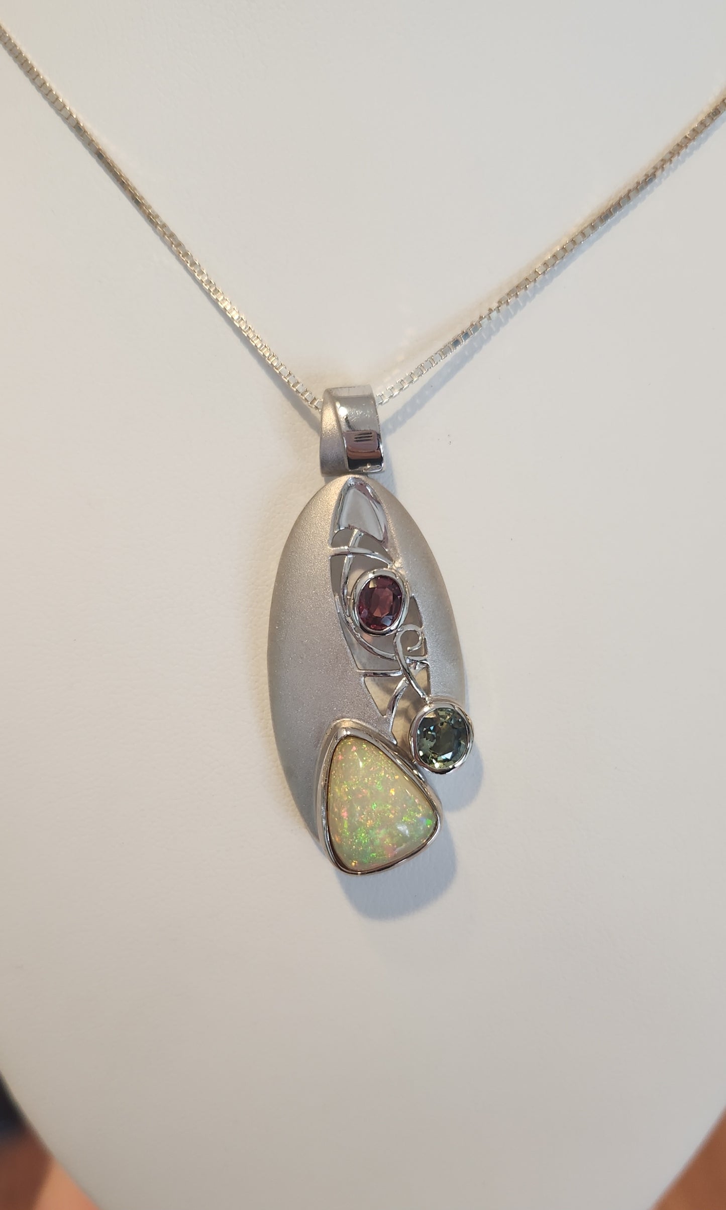 Sterling silver Ethiopian opal statement pendant with tourmaline