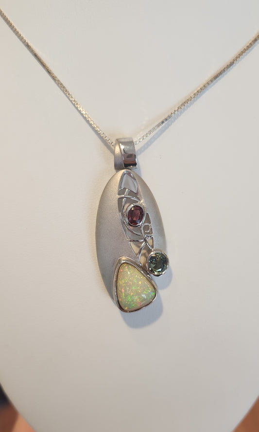 Sterling silver Ethiopian opal statement pendant with tourmaline