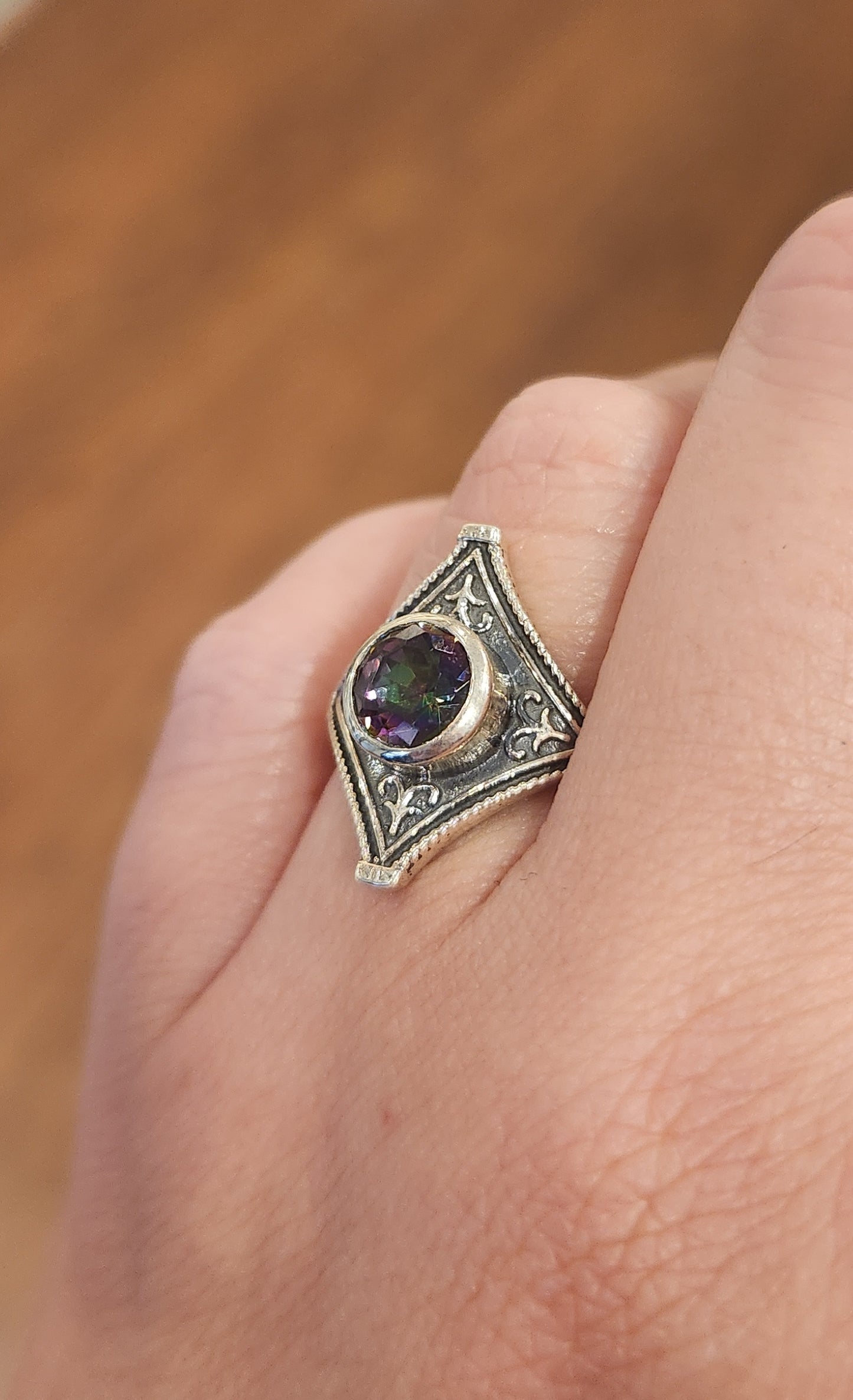 Sterling silver mystic topaz saddle ring