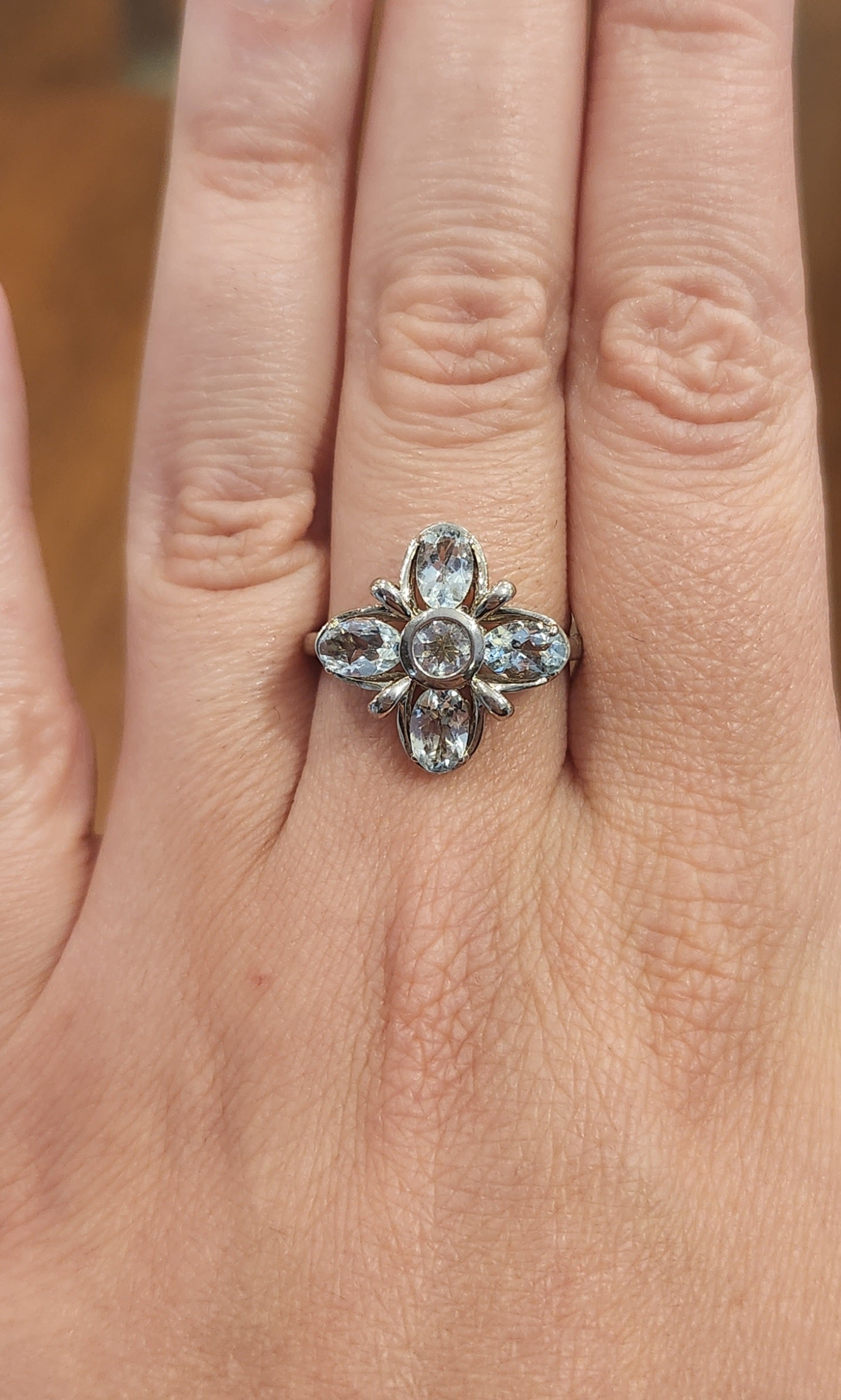 Sterling silver blue topaz flower ring